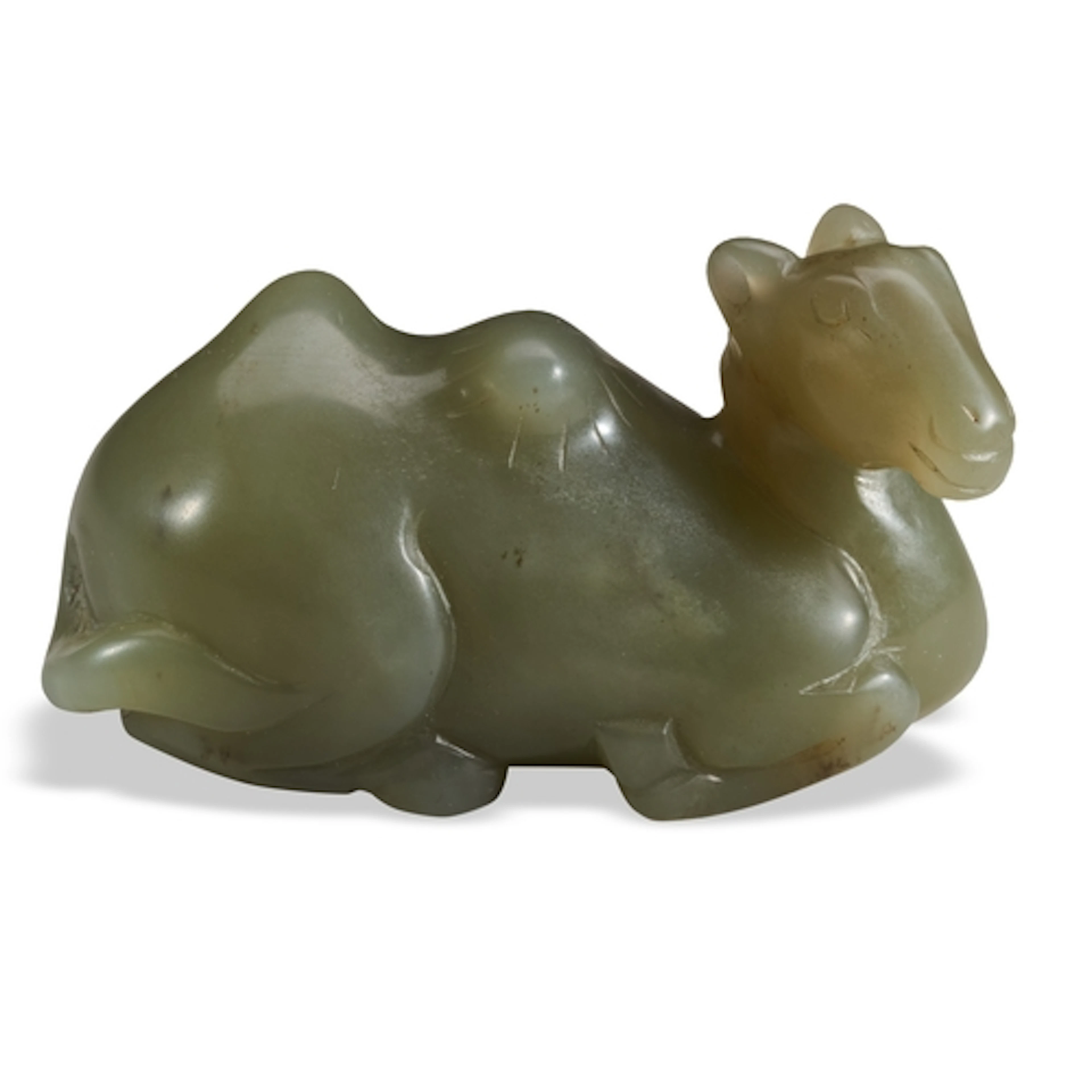 A CELADON JADE FIGURE OF A CAMEL QING DYNASTY, 19TH CENTURY...