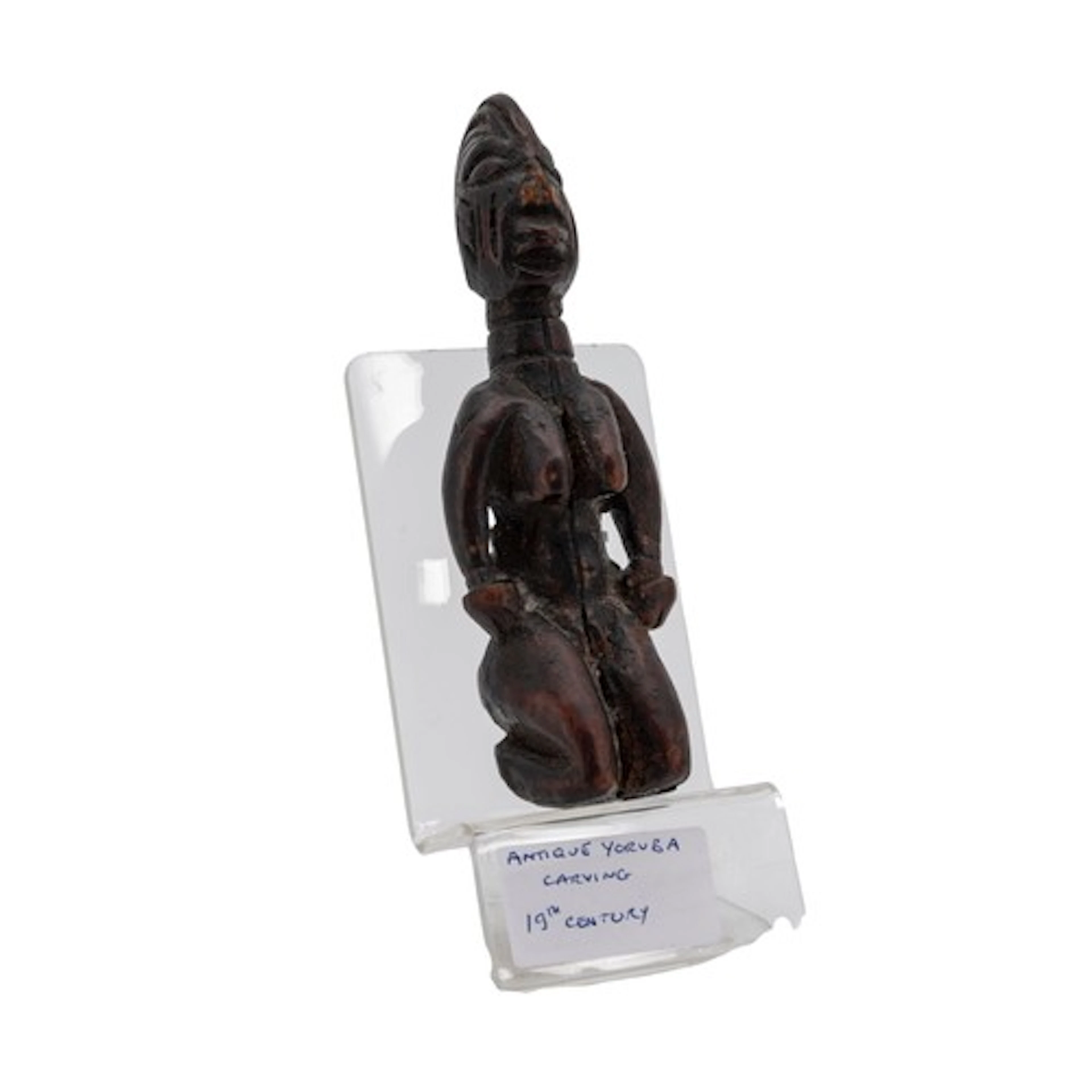 A YORUBA WOODEN FEMALE FERTILITY FIGURE of small proportions...