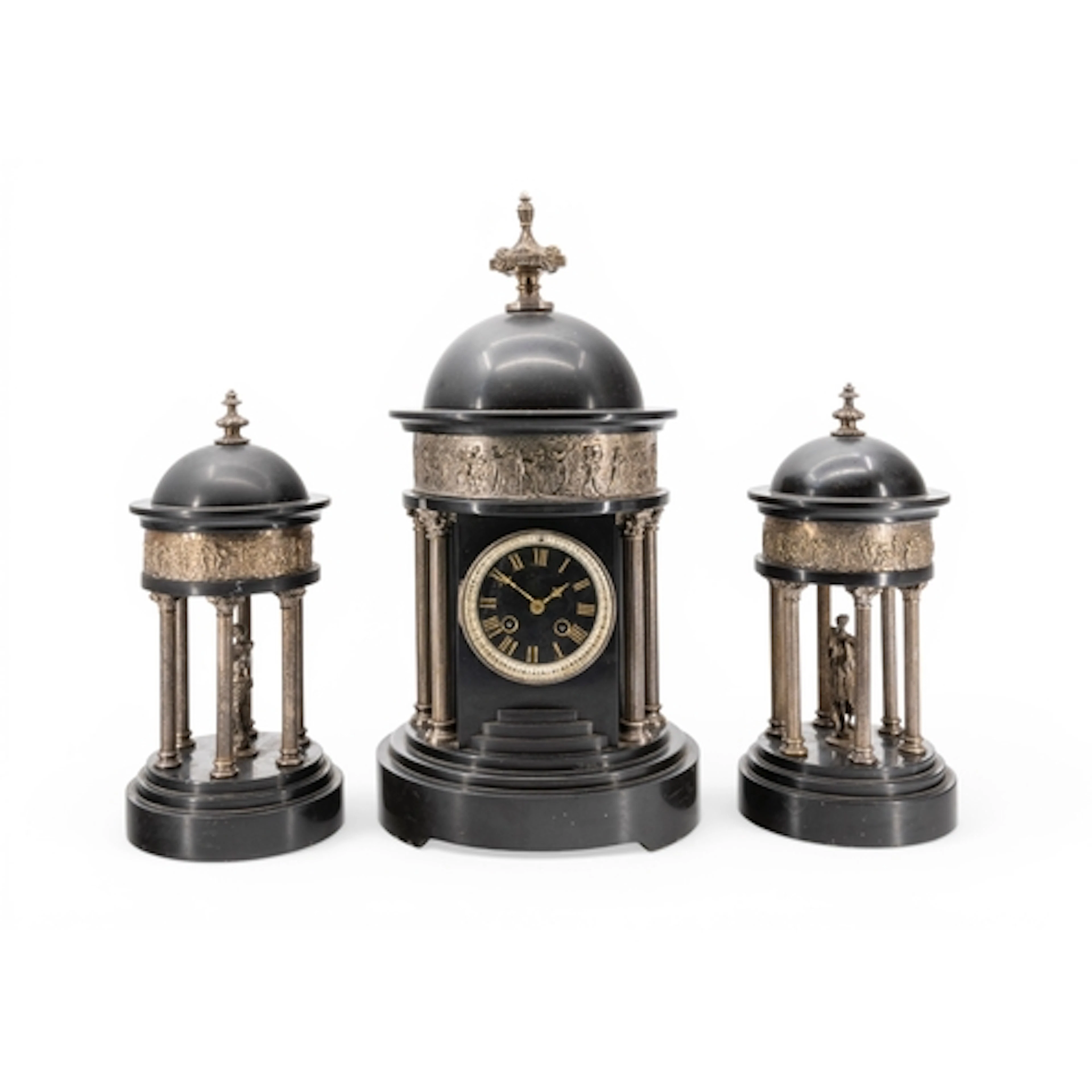 A VICTORIAN BLACK MARBLE CLOCK GARNITURE in the form of a cl...