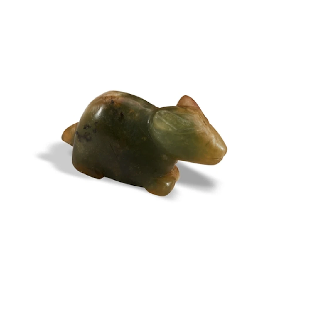 A SMALL MOTTLED CELADON JADE FIGURE OF A RABBIT 20TH CENTURY...