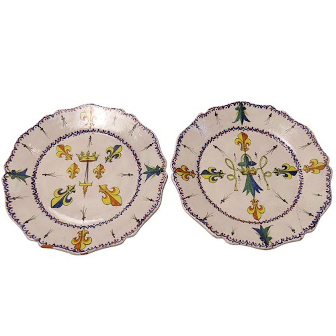 A PAIR OF 19TH CENTURY FRENCH FAIENCE PLATES decorated with ...