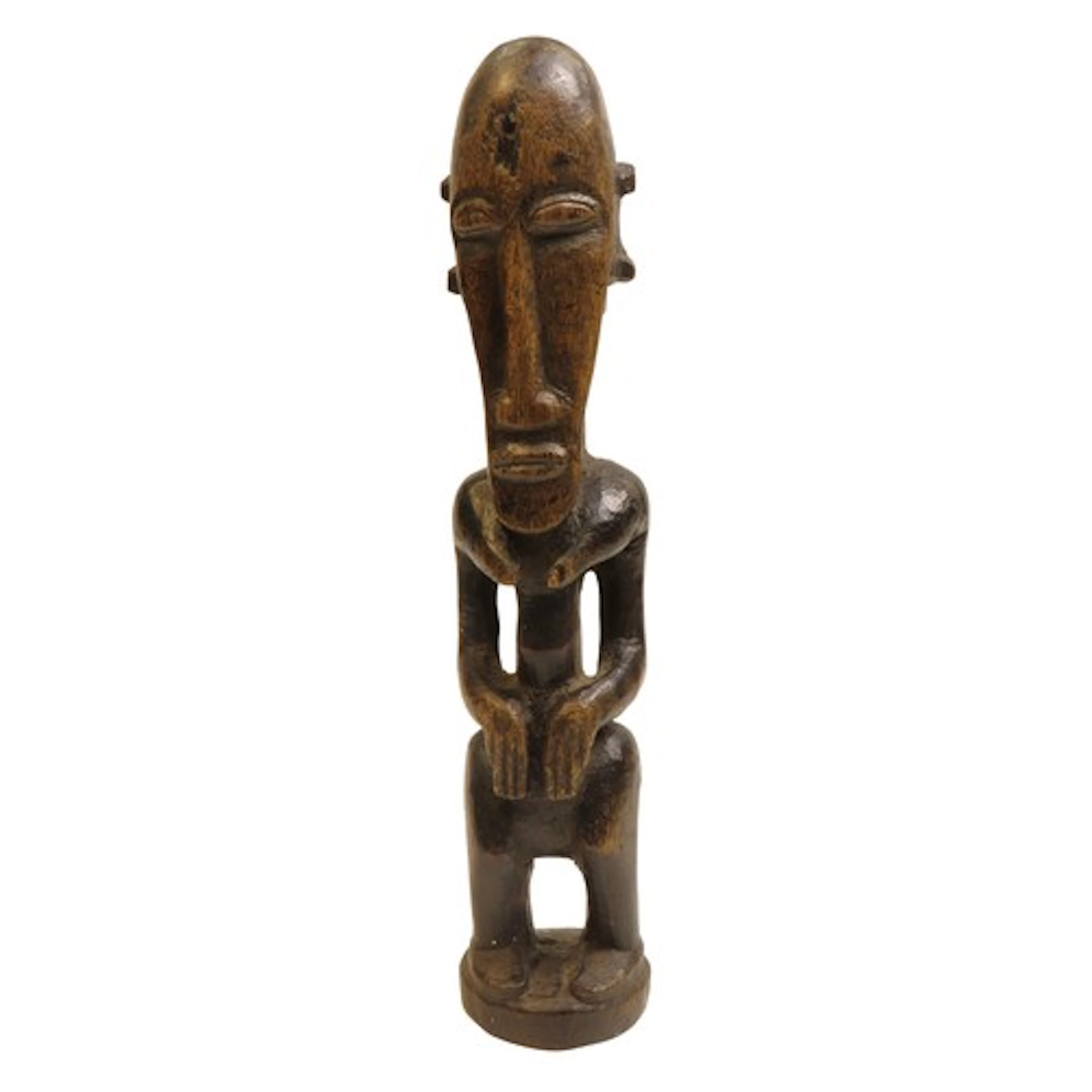 AN AFRICAN FEMALE FETISH FIGURE, possibly Songye, the face o...