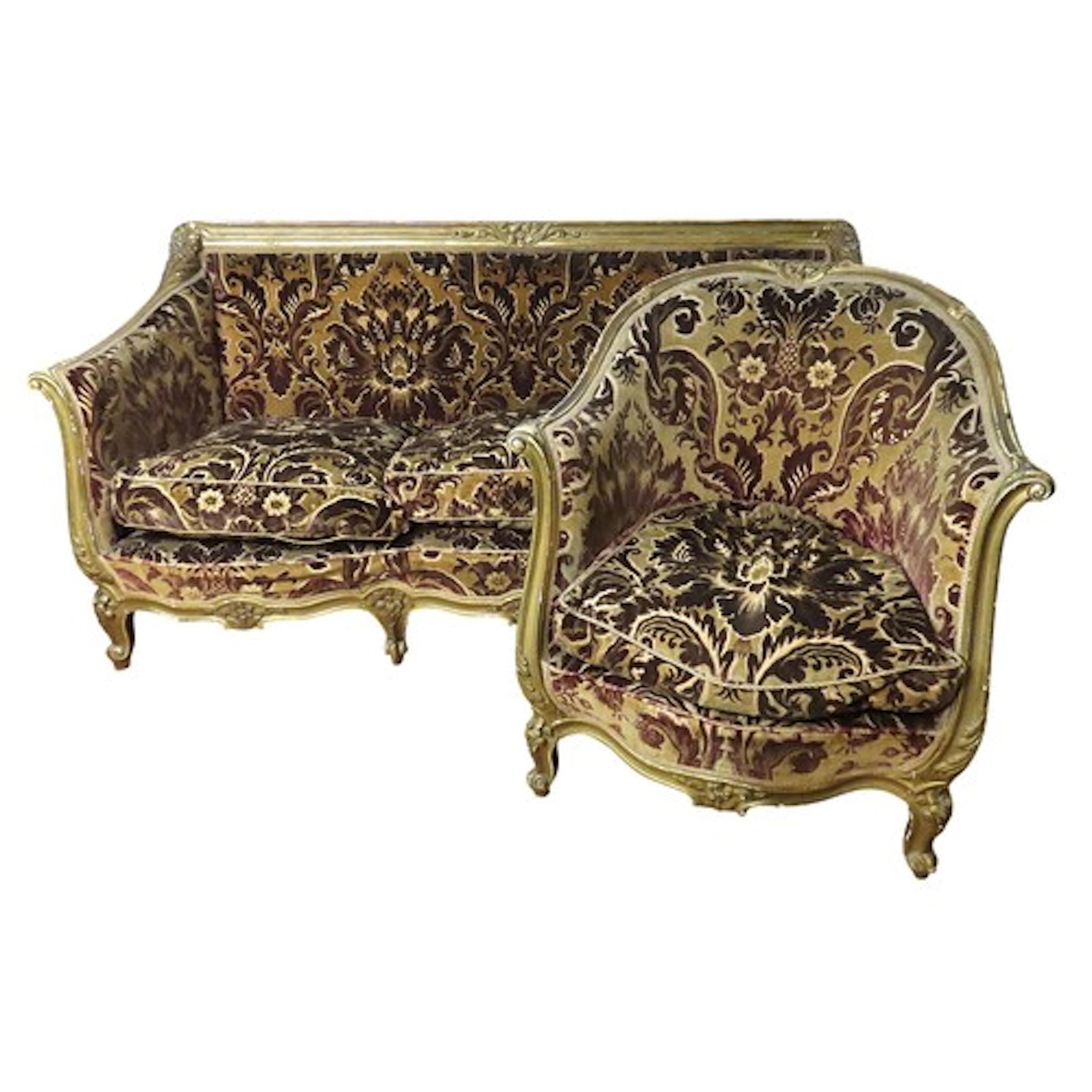 A FRENCH GILT GESSO THREE-SOFA the channel carved frame with...