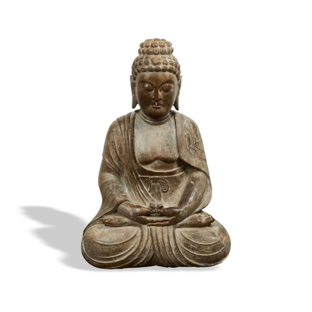 A FINE AND RARE CARVED STONE FIGURE OF BUDDHA POSSIBLY KOREA...