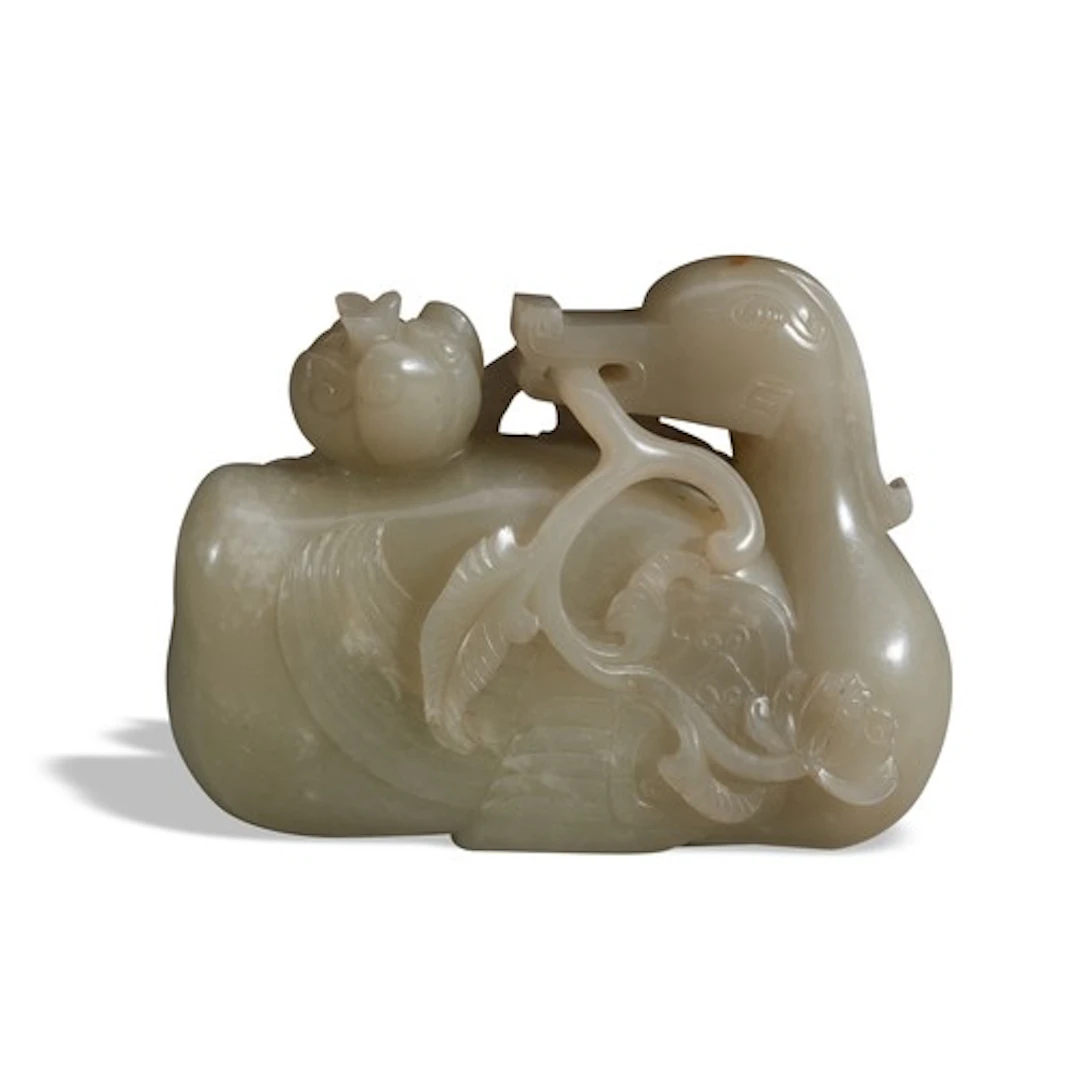 A CELADON JADE OF GOOSE 20TH CENTIRY 青白玉鹤衔灵芝 二十世纪 Carved re...