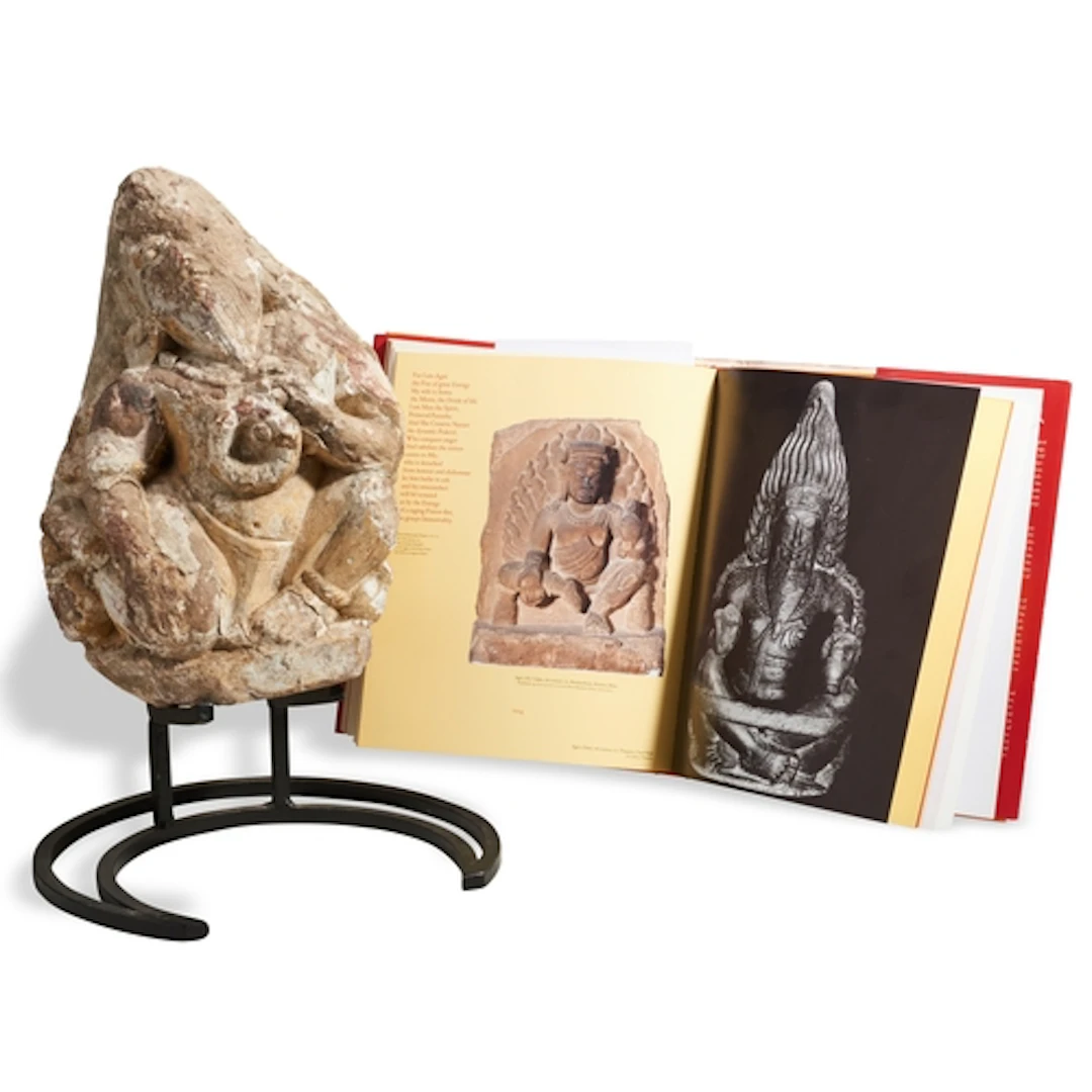 A RARE INDIAN CARVED STONE AND STUCCO FIGURE OF AGNI 12TH - ...