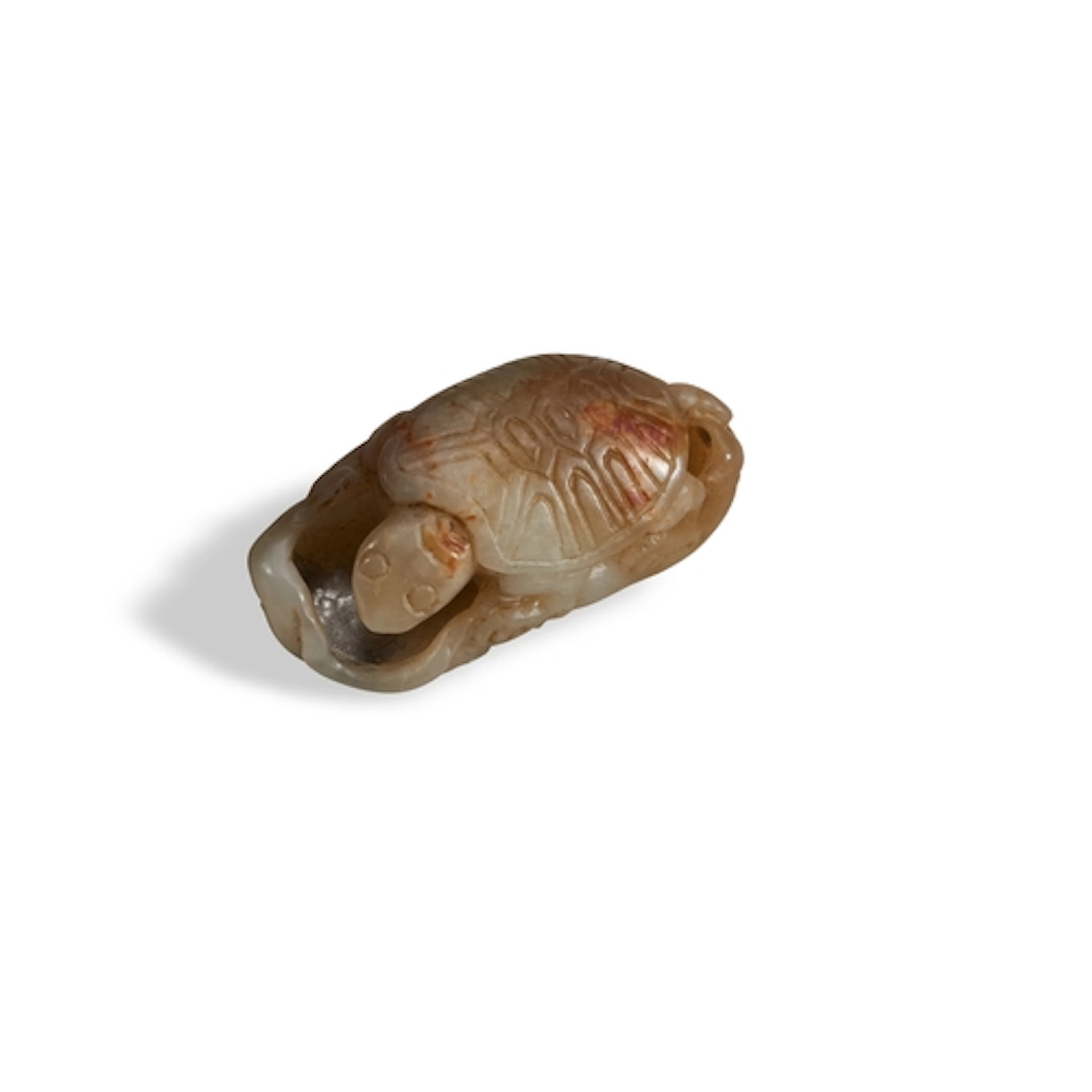 A CELADON AND RUSSET FIGURE OF A TURTLE QING DYNASTY, 19TH C...