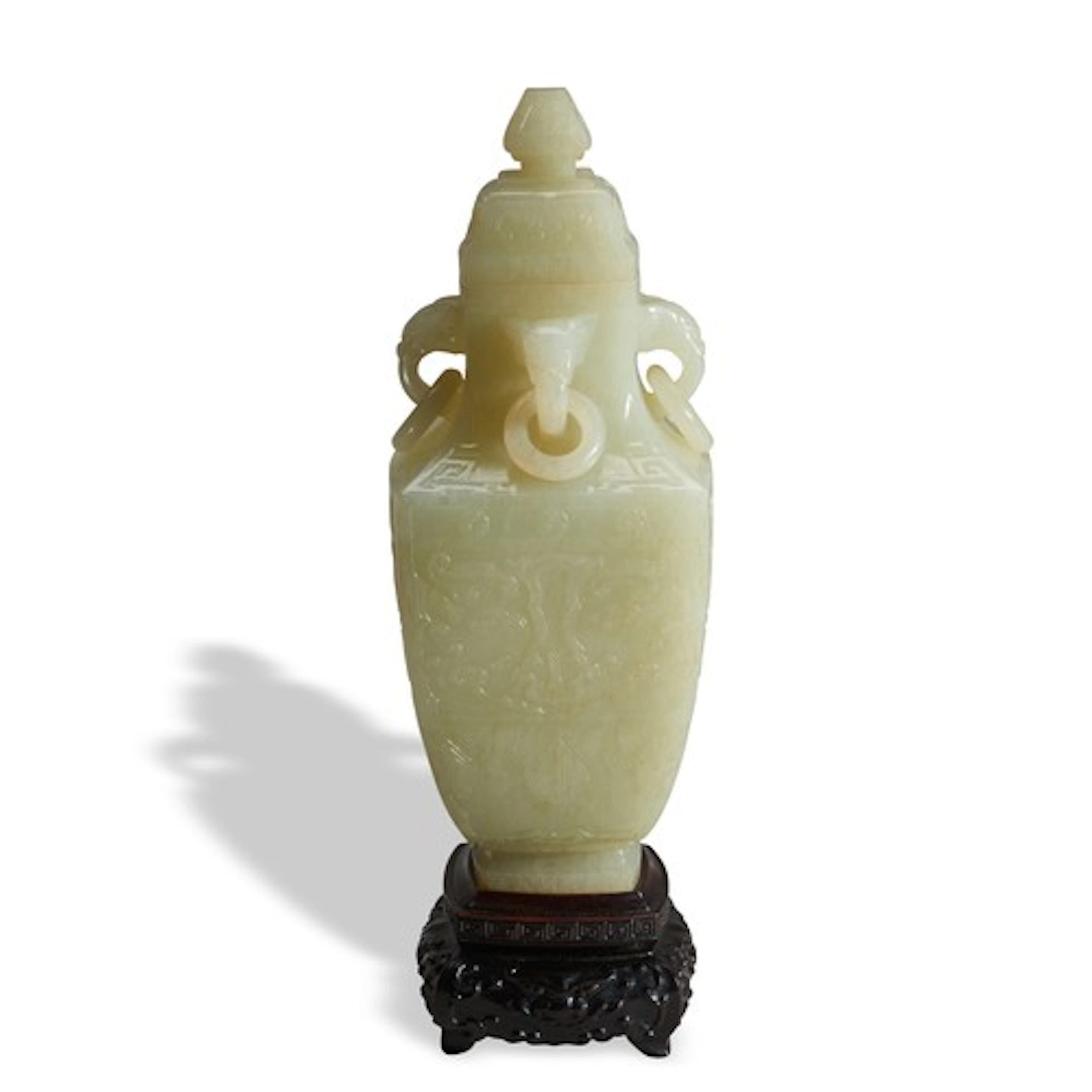 AN ARCHAISTIC CELADON JADE FOUR-SIDED 'HU' VASE WITH COVER A...