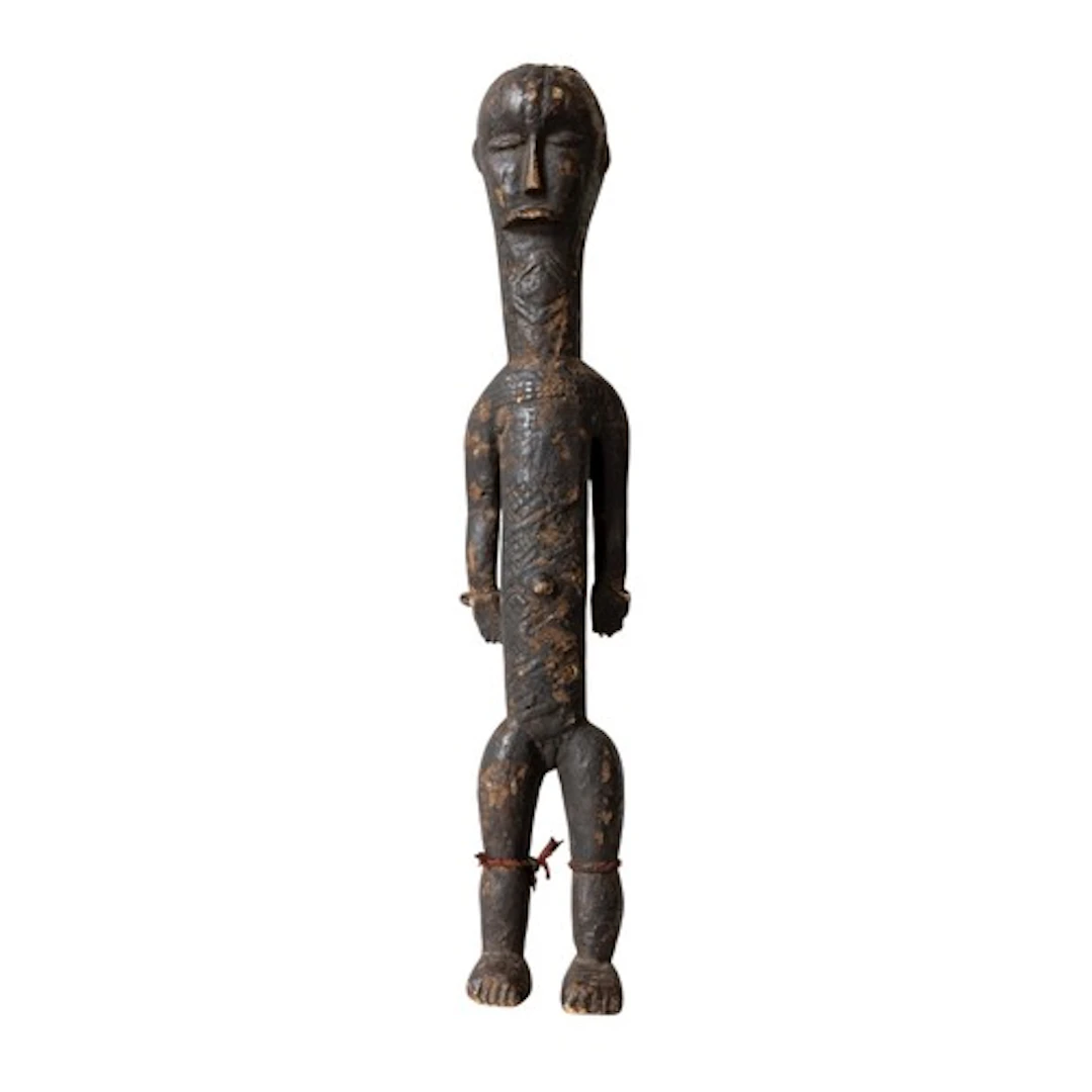 A KULANGO WOODEN ANCESTRAL FIGURE heavily patinated and deco...