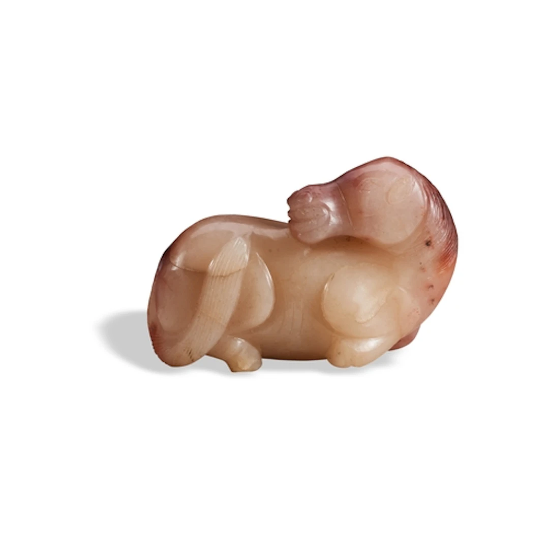 A RARE CARNELIAN AGATE FIGURE OF A HORSE QING DYNASTY, 18TH...