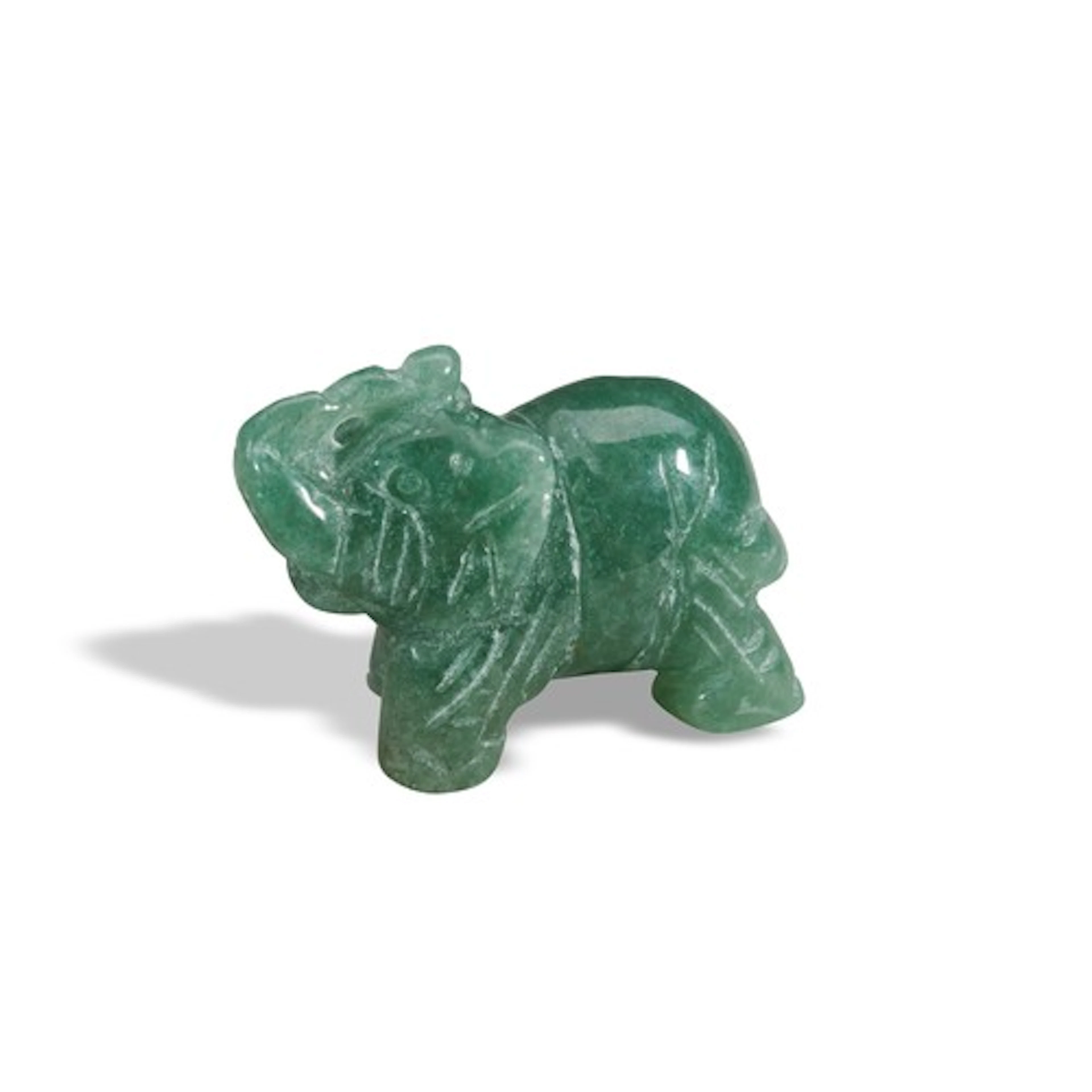 A GREEN HARDSTONE CARVING OF AN ELEPHANT 20TH CENTURY 青玉象 二十...
