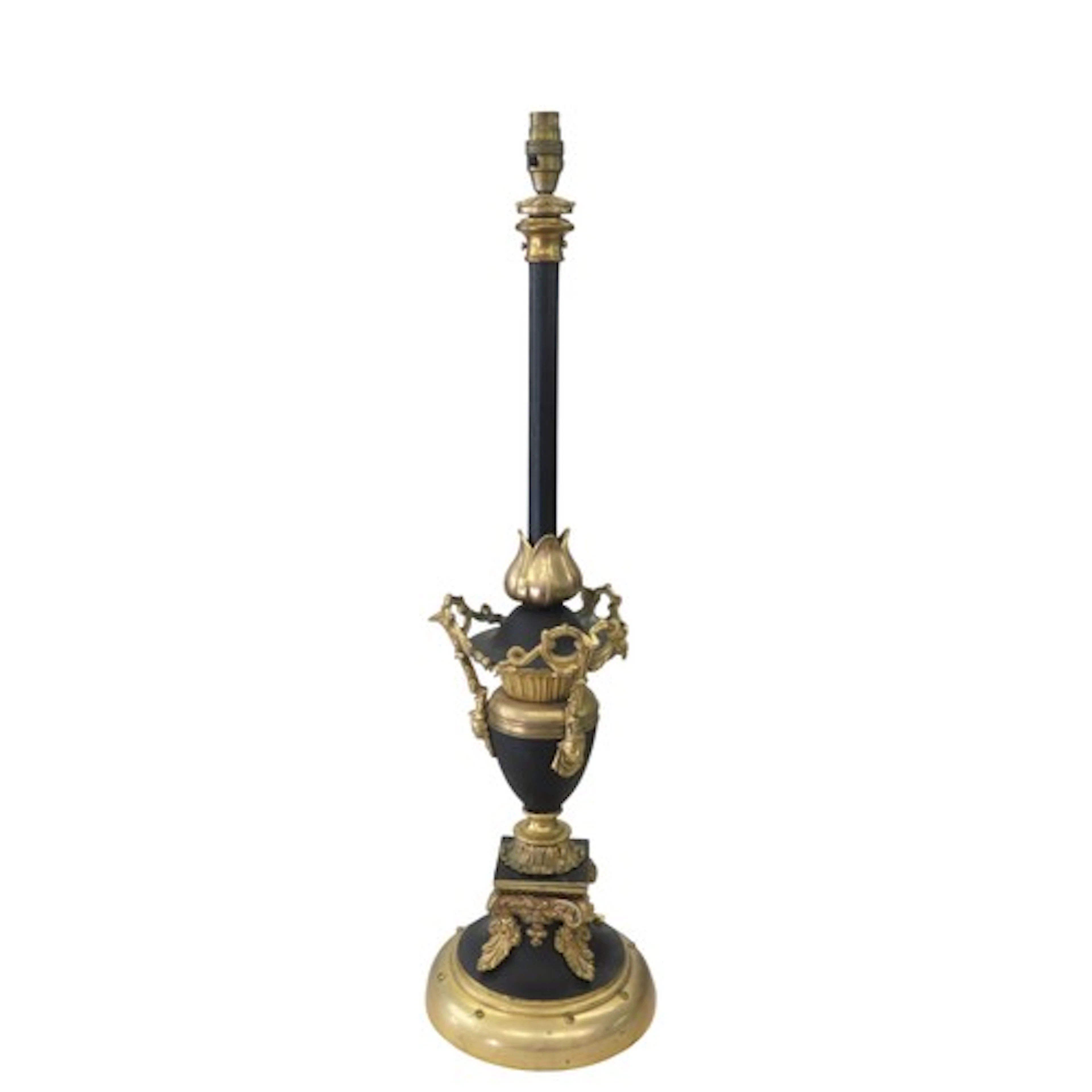 A FRENCH TOLE WARE AND GILT BRONZE EMPIRE-STYLE TABLE LAMP E...