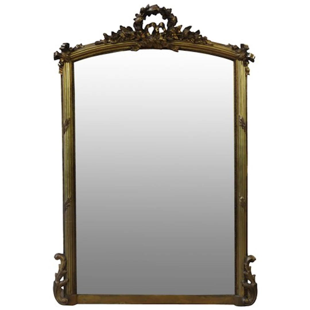 AN ARCH TOP PIER MIRROR the bevelled rectangular plate mount...