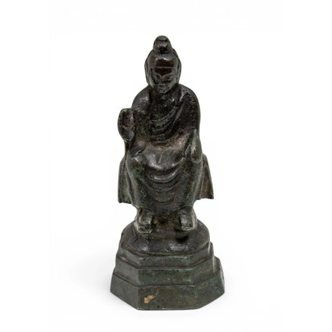 A BRONZE BHUDDA TANG DYNASTY (618–907 AD) 唐 铜佛像 shown seated...