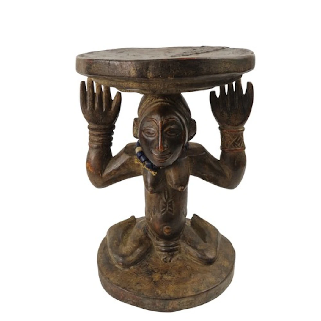 A LUBA STOOL the finely carved seated female figure with gla...