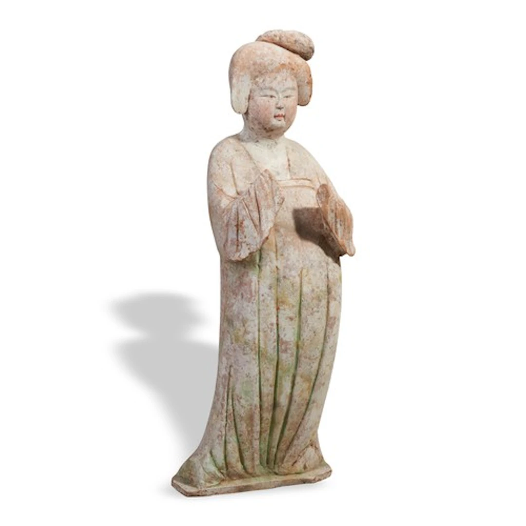 A LARGE PAINTED POTTERY FIGURE OF A COURT LADY TANG DYNASTY ...