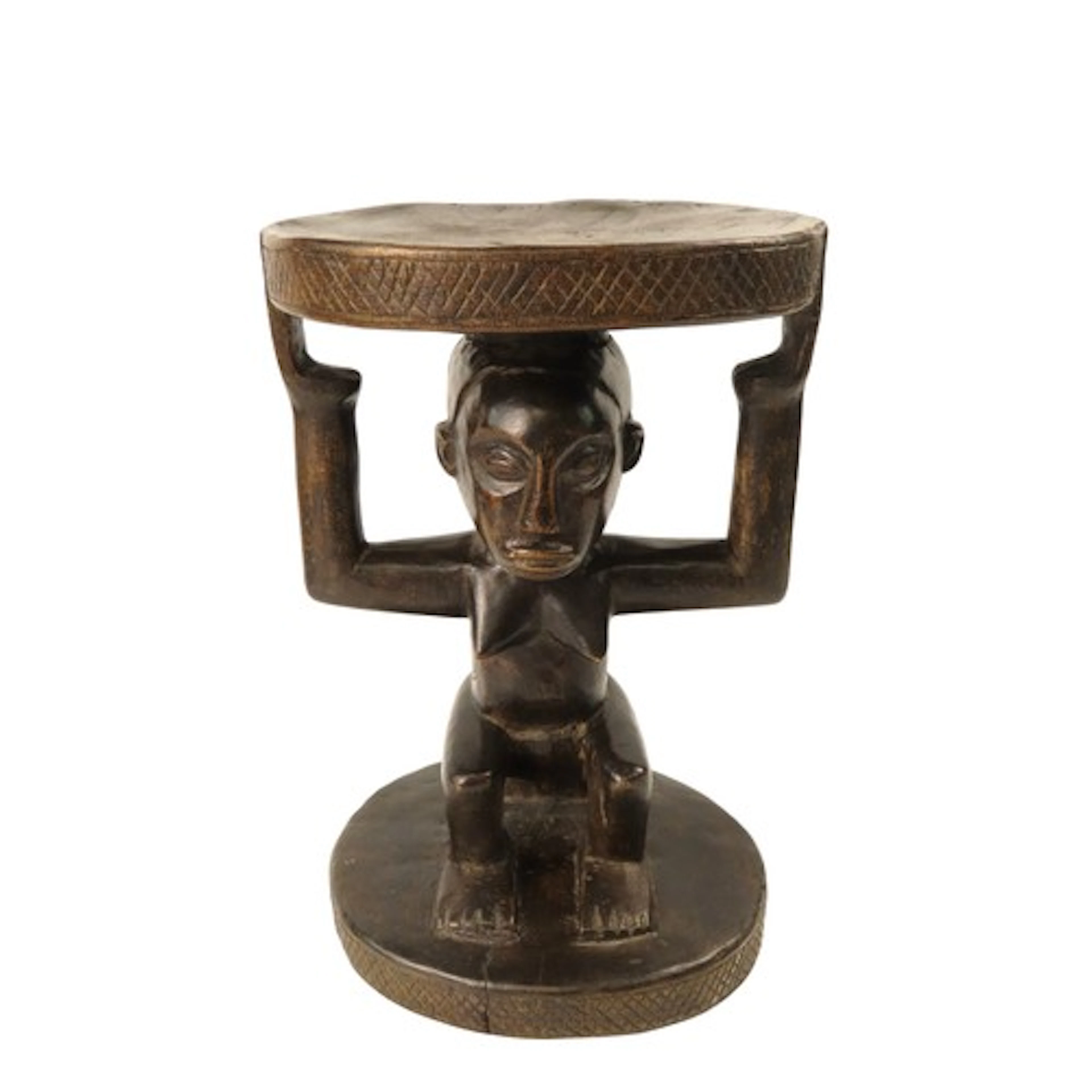 A LUBA STOOL, carveed with a seated female figure, her hands...