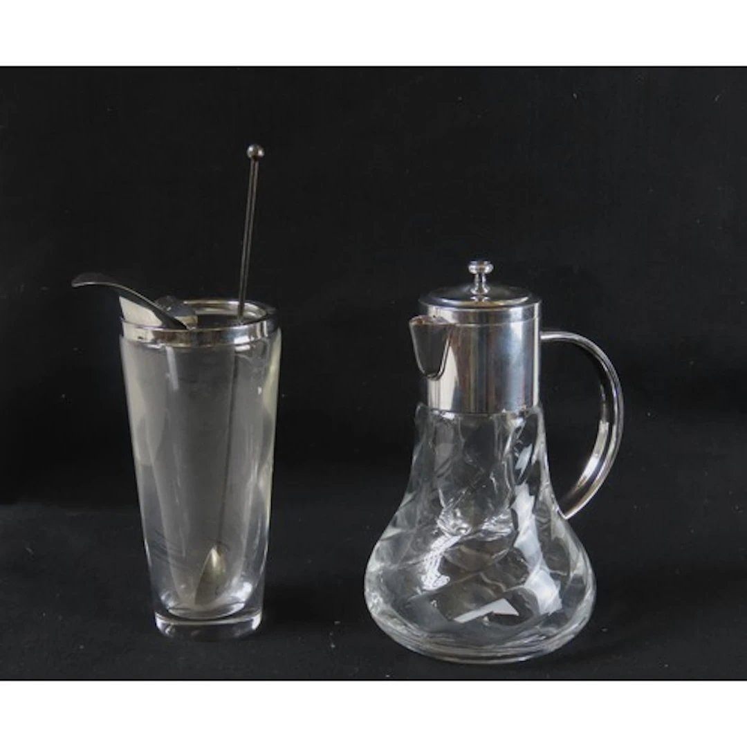 AN ASPREY ART DECO COCKTAIL MIXER GLASS AND AN ASPREY LEMONA...
