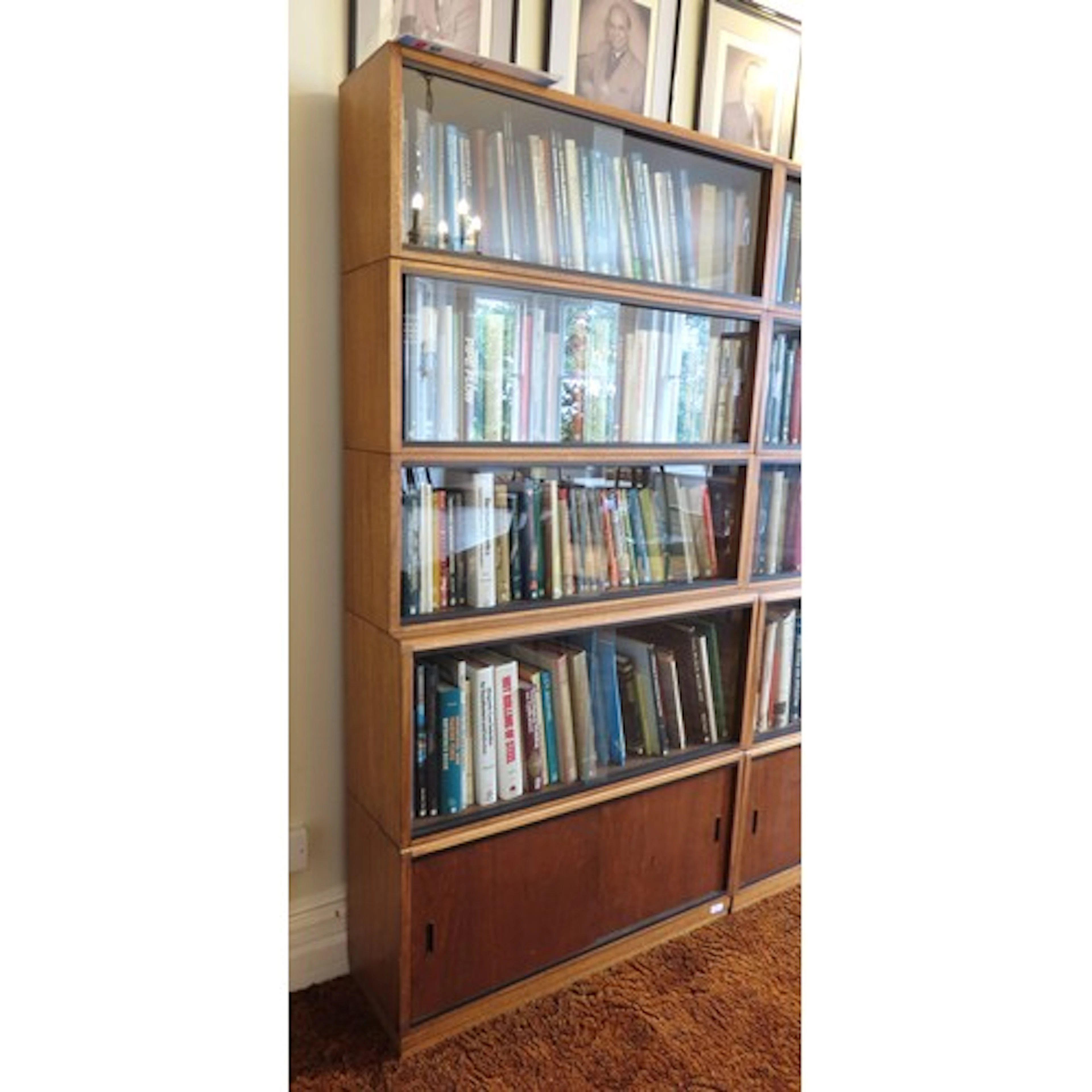 A SIMPLEX SECTIONAL LIBRARY BOOKCASE CIRCA 1965 comprised ...