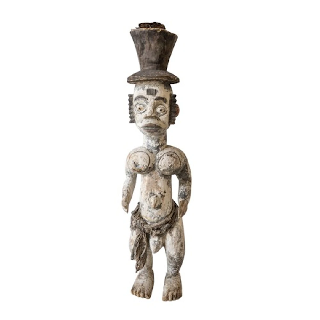 AN IGBO 'SHRINE' FIGURE of stylised form with 'hat', white p...