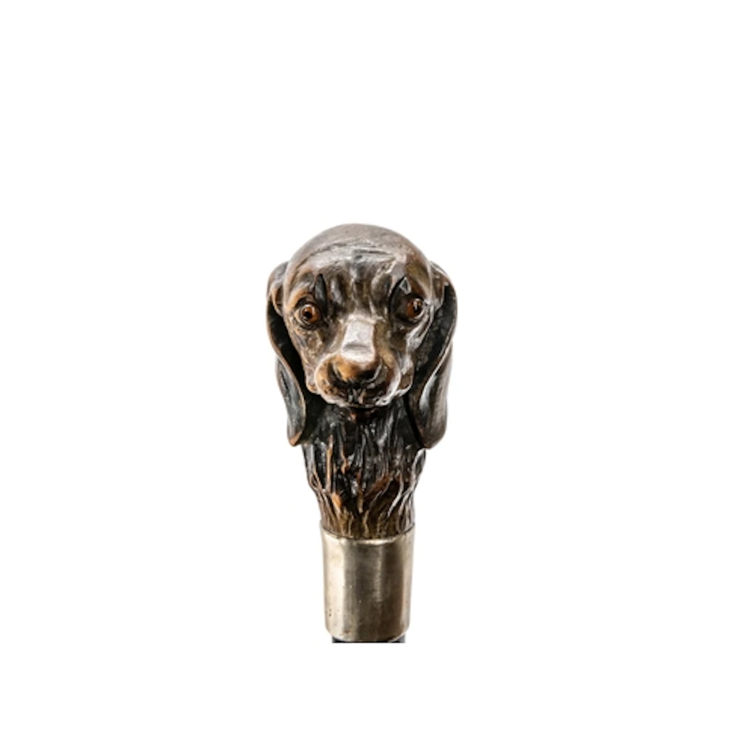 A CONTINENTAL DOG HEAD HANDLED WALKING CANE the spaniel hand...