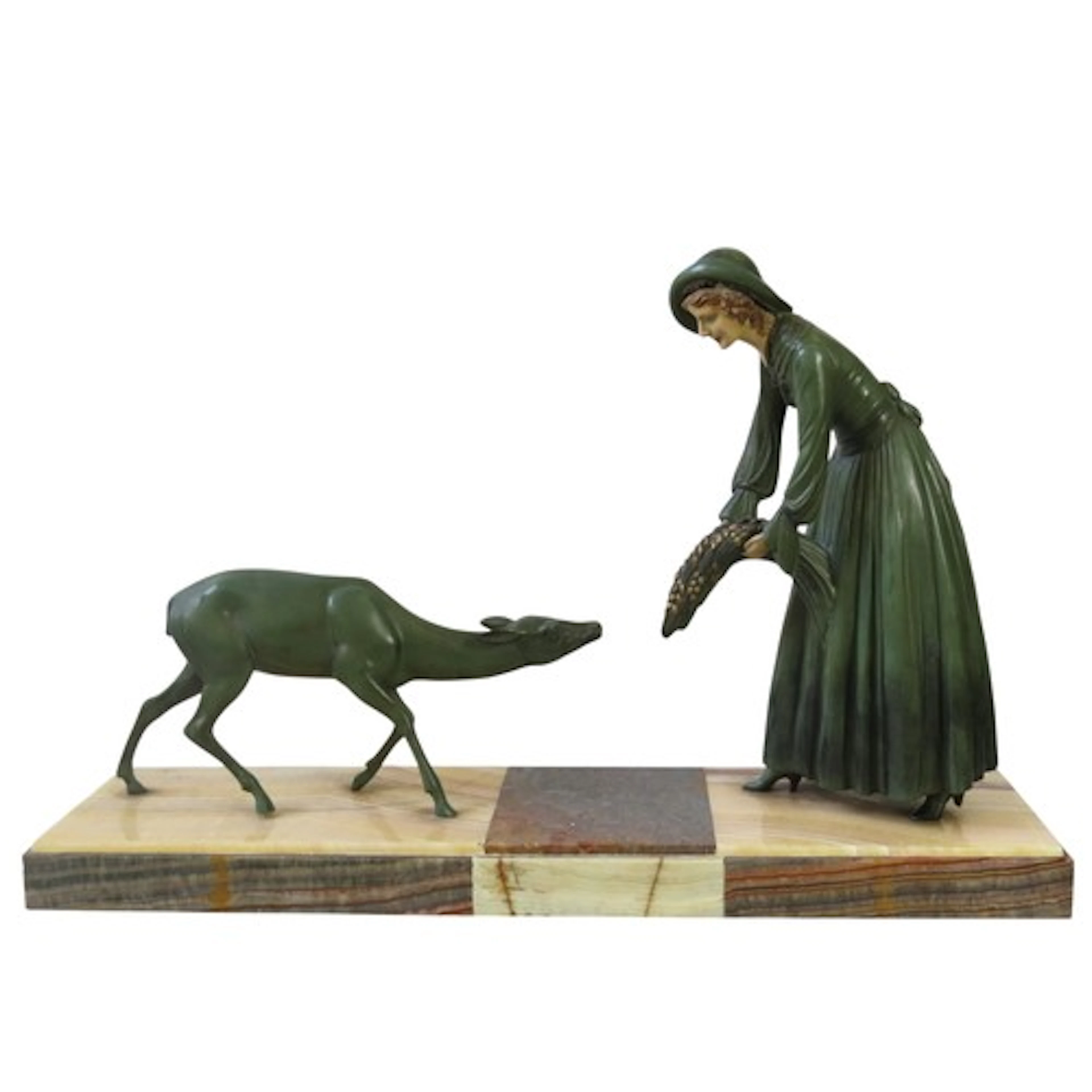 AN ART DECO PAINTED SPELTER GROUP CIRCA 1930 depicting a wom...