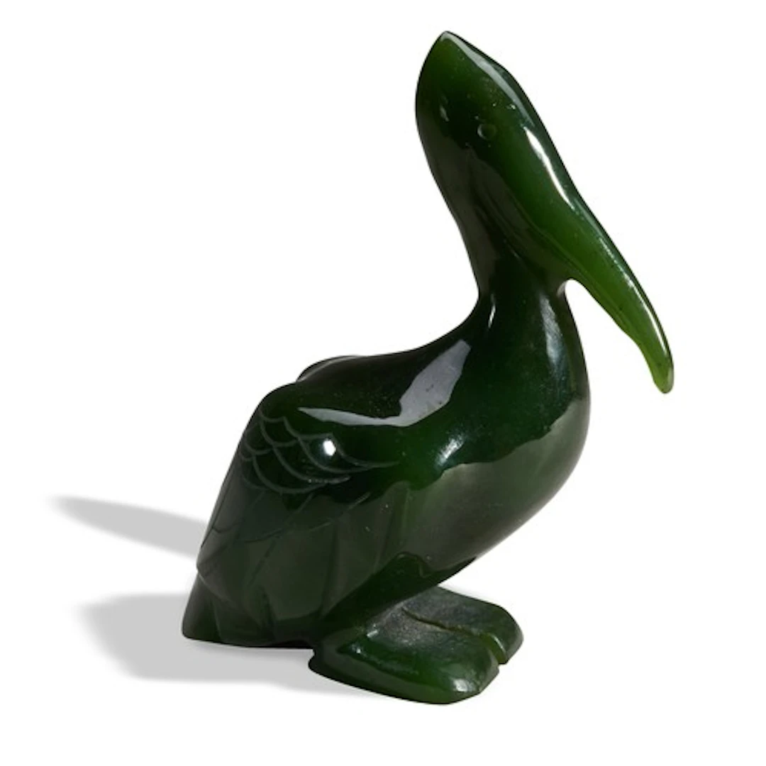 A GREEN HARDSTONE FIGURE OF A PELICAN 20TH CENTURY 碧玉鹅 二十世纪...
