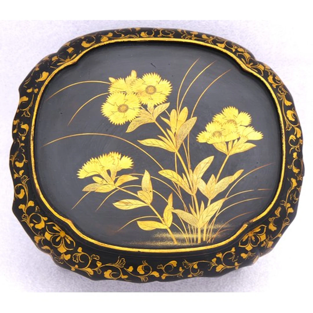 A SMALL JAPANESE GILT-DECORATED BLACK LACQUER STAND MEIJI /...