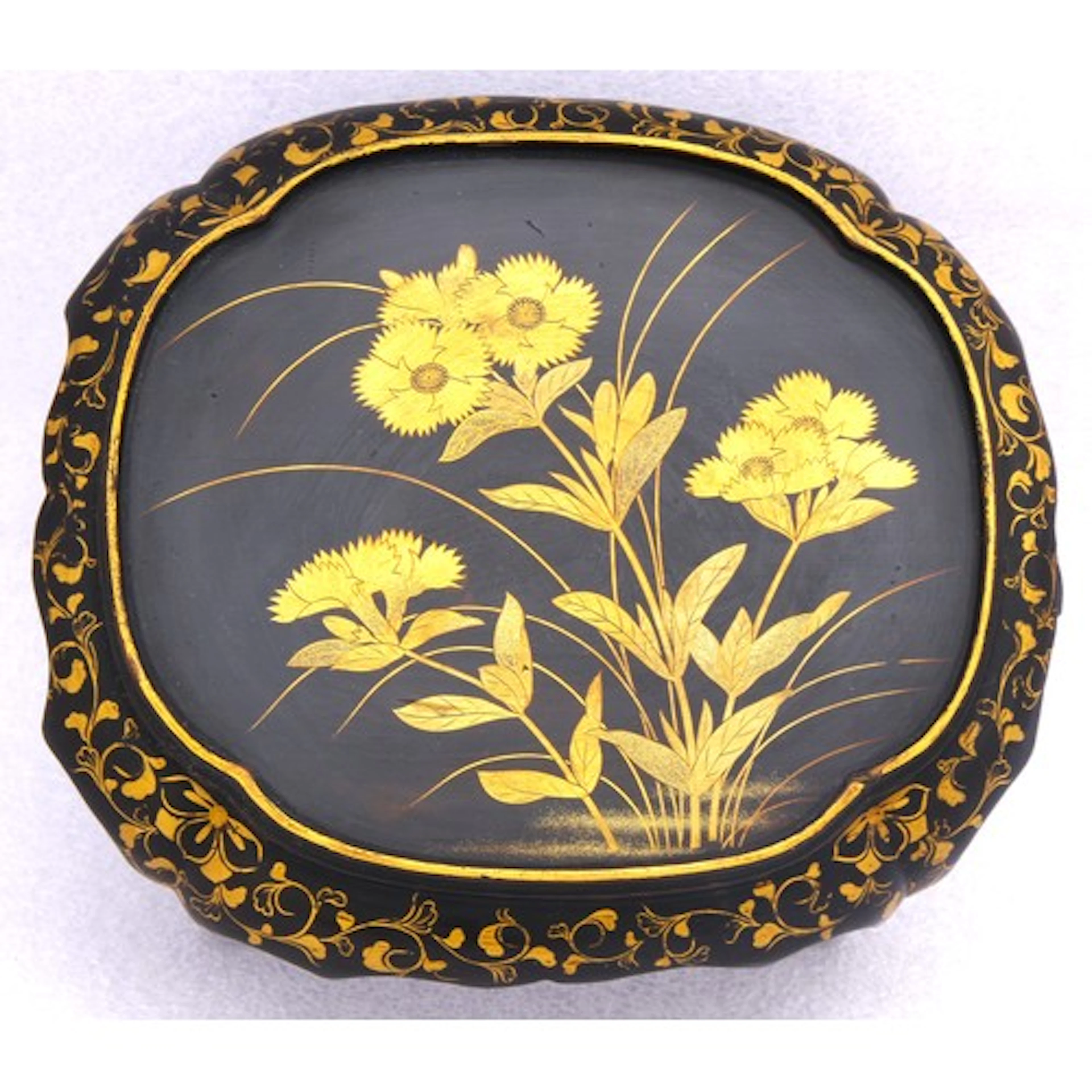 A SMALL JAPANESE GILT-DECORATED BLACK LACQUER STAND MEIJI /...