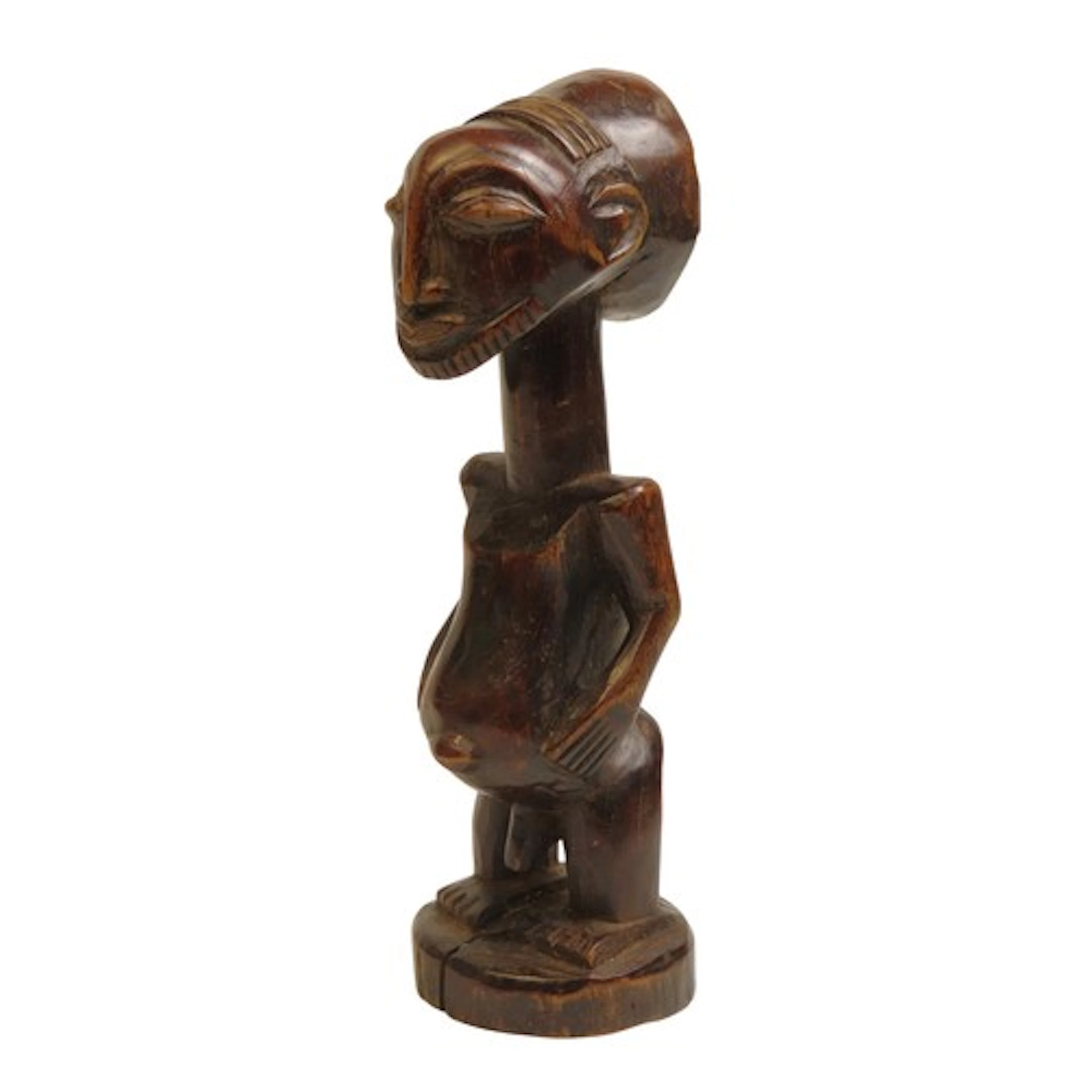 A SMALL HEMBA FIGURE of a male, his face with a fine strip b...