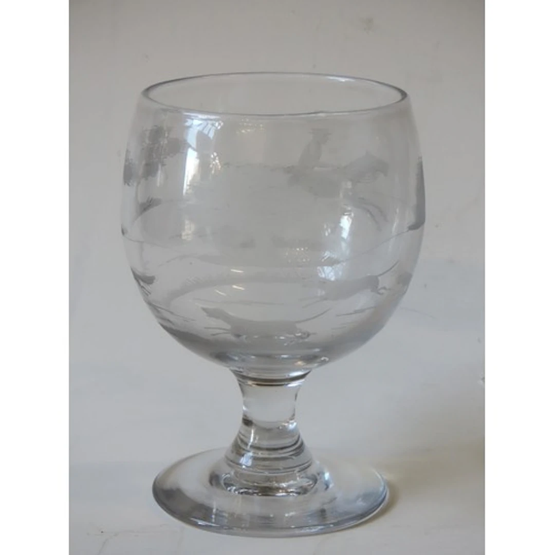A LARGE ENGRAVED GLASS HUNTING GOBLET 19TH CENTURY the sides...