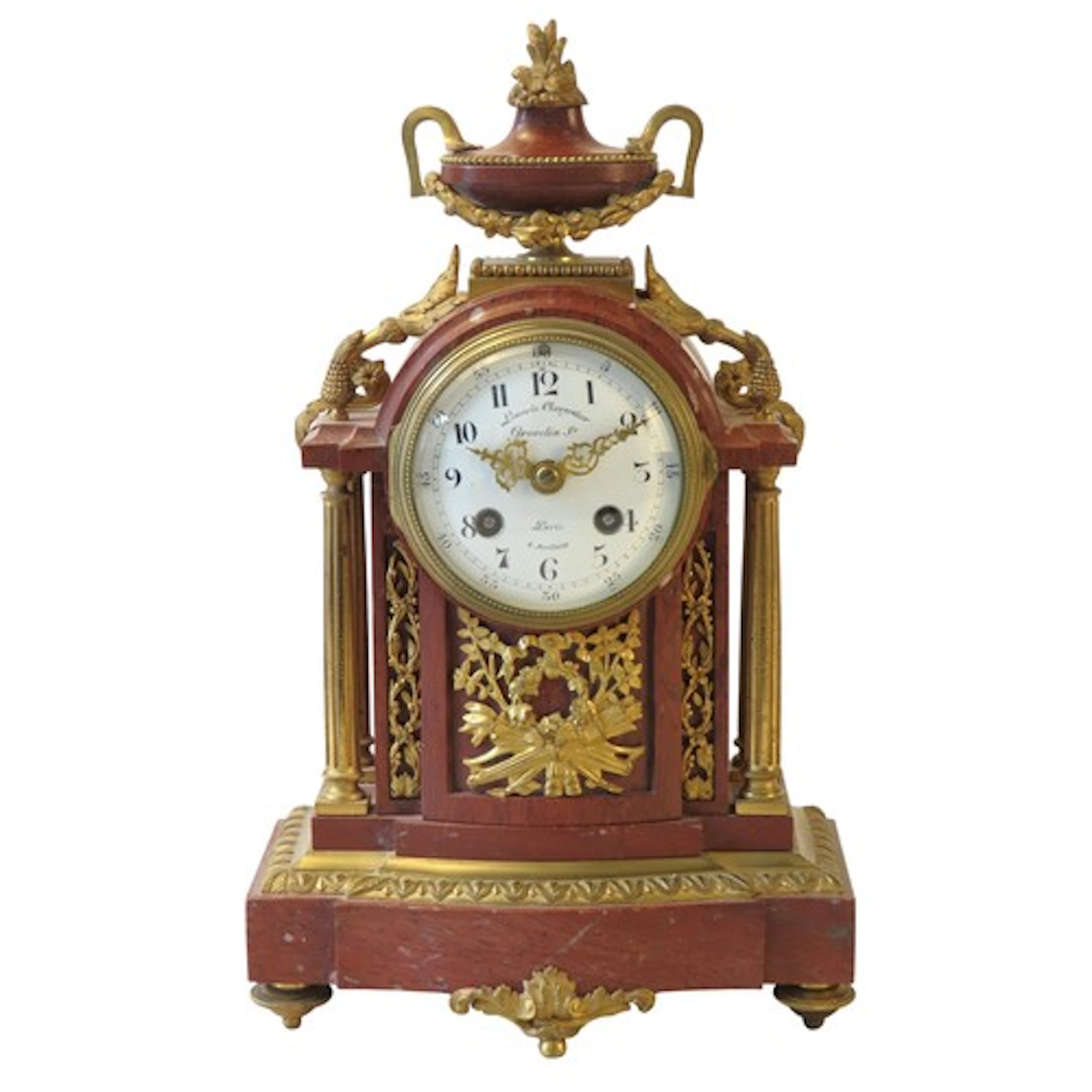 A LE MERLE-CHARPENTIER RED MARBLE AND ORMOLU MANTLE CLOCK CI...