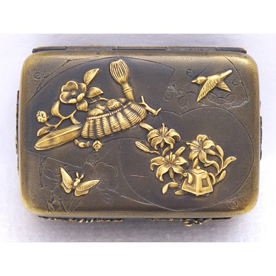 A SMALL JAPANESE MIXED METAL BOX AND COVER LATE MEIJI PERIOD...