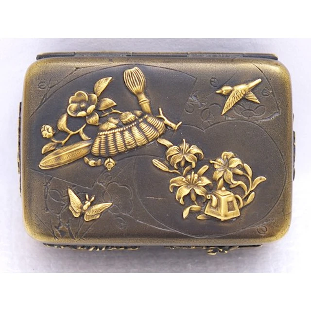 A SMALL JAPANESE MIXED METAL BOX AND COVER LATE MEIJI PERIOD...