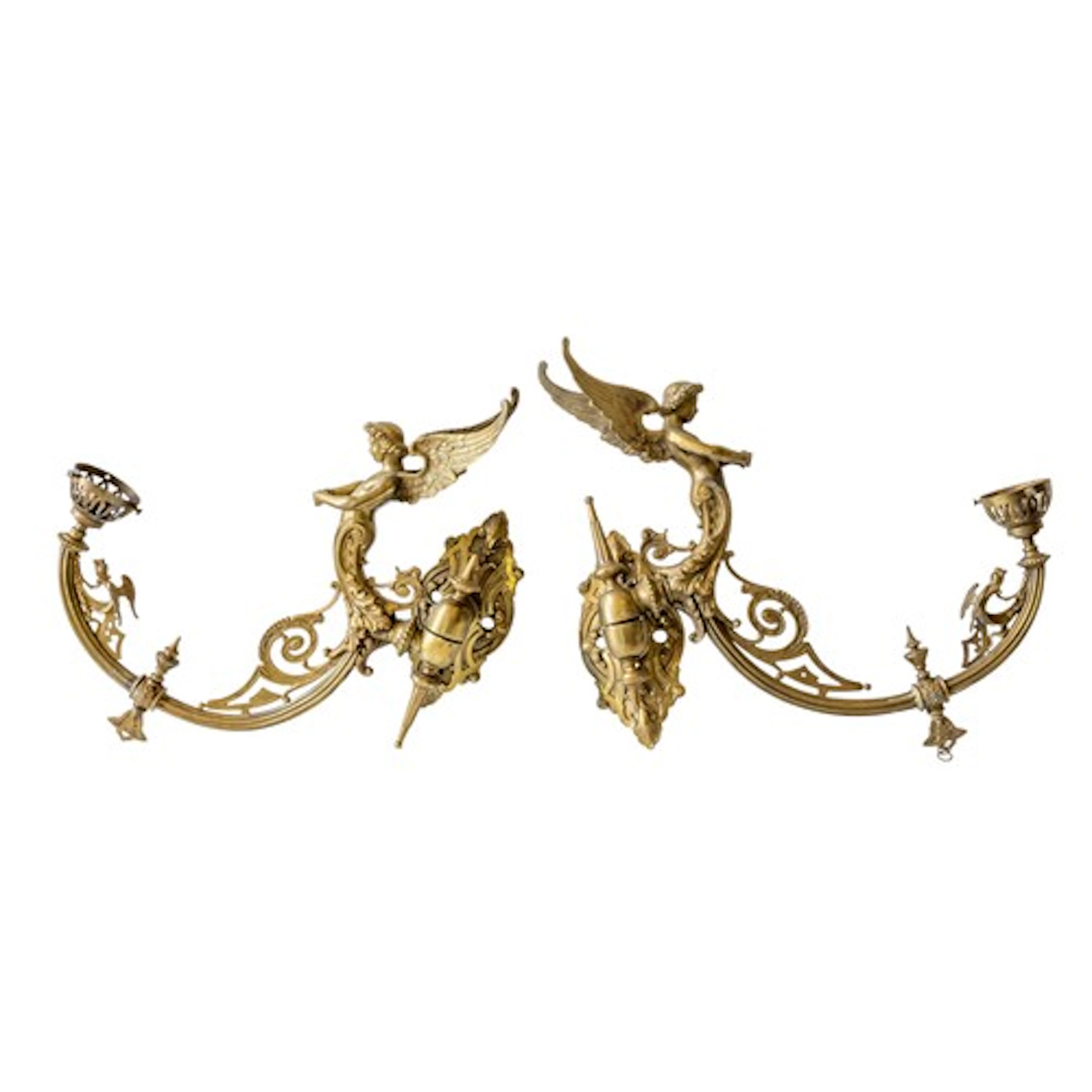 A PAIR OF FANCY BRASS GAS SCONCES ornately cast with winged ...