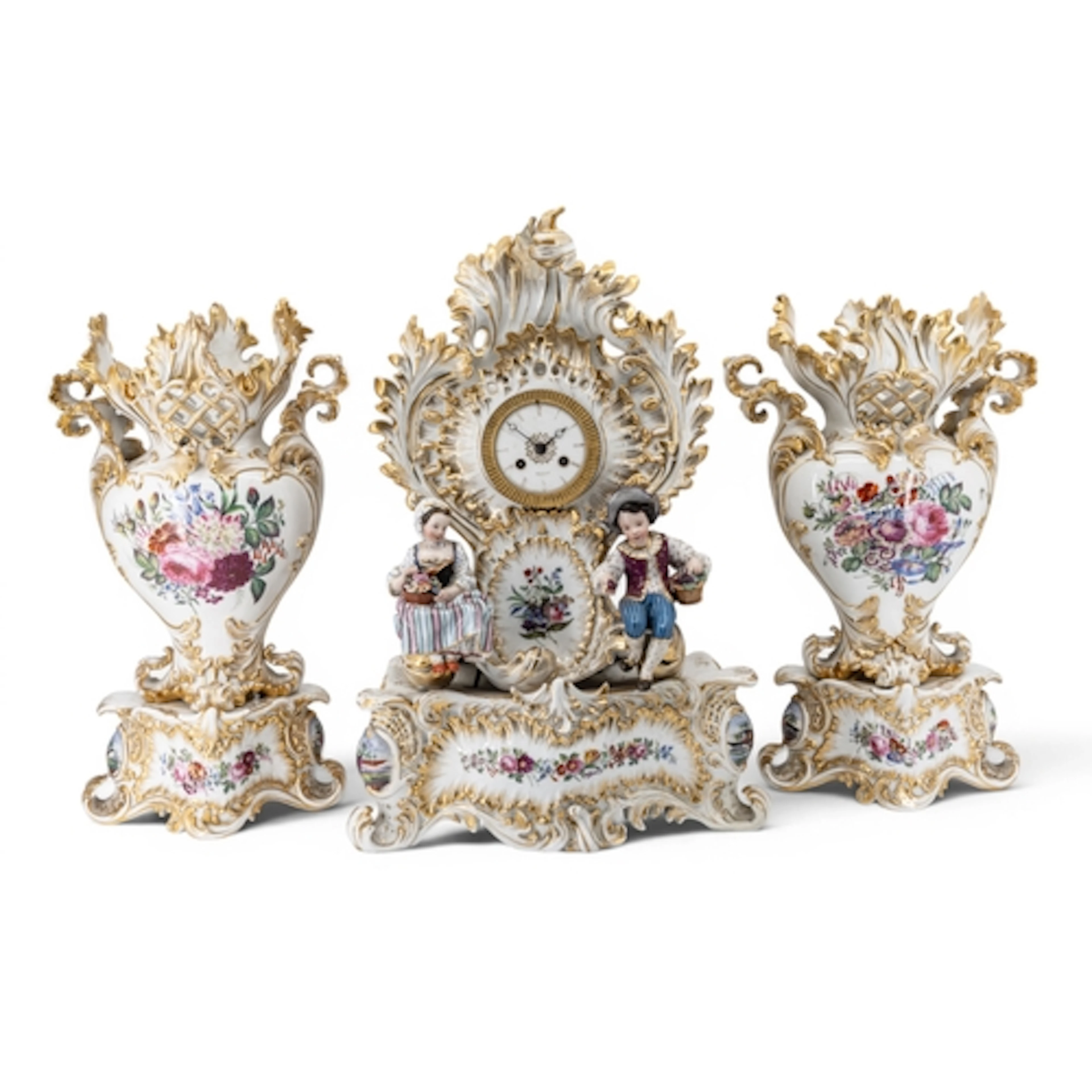 AN IMPRESSIVE AND ORNATE FRENCH PORCELAIN CLOCK GARNITURE th...