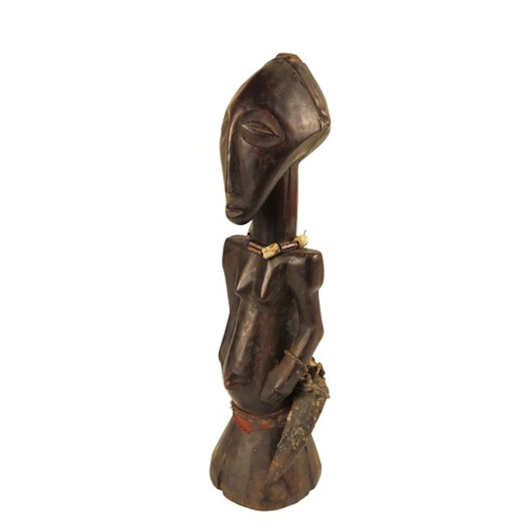 A SONGYE POWER FIGURE, DMC, carved wood with glass bead neck...