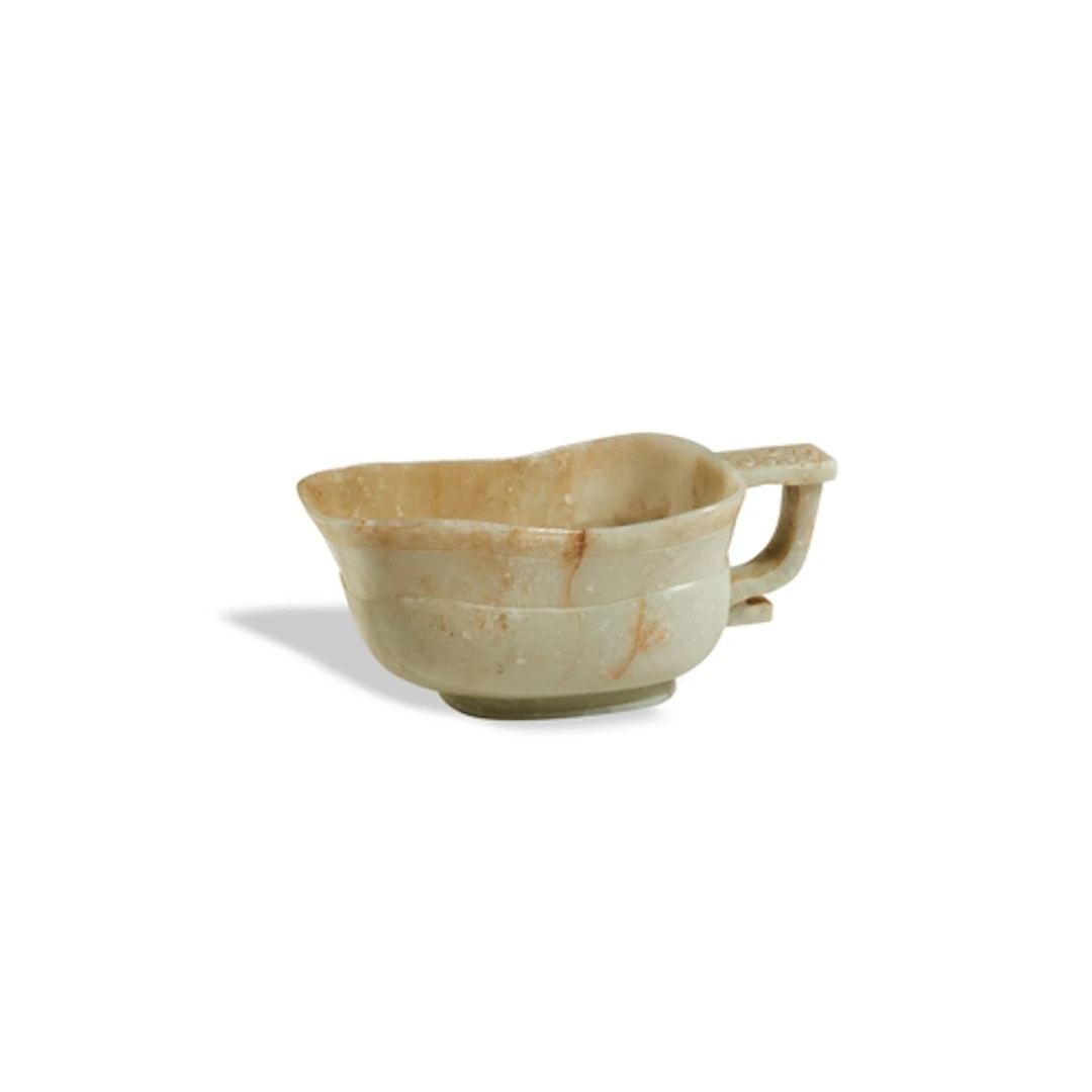 A GOOD ARCHAISTIC PALE-CELADON JADE POURING VESSEL, YI MING ...