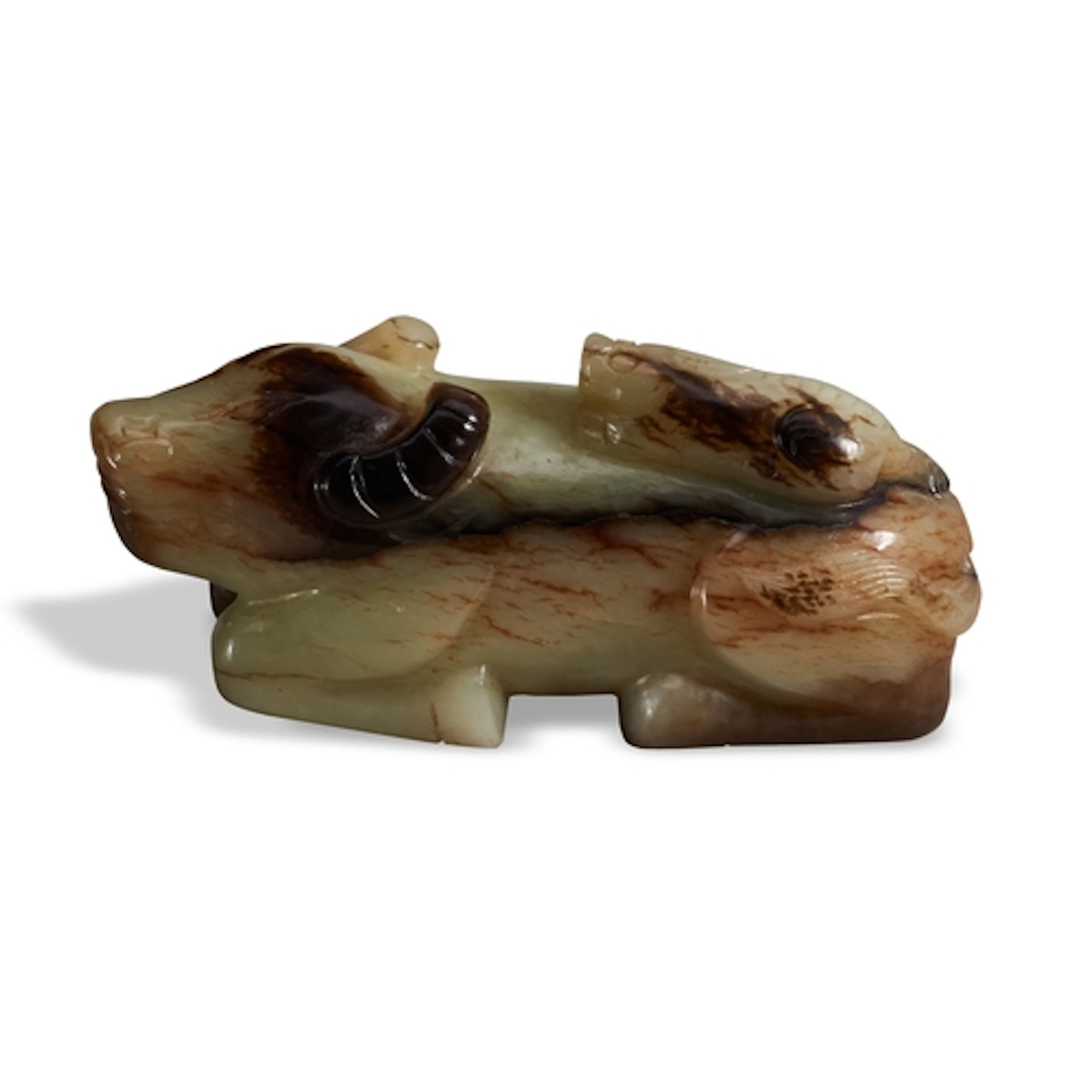 A MOTTLED-CELADON AND STRIATED JADE 'BUFFALO AND LION' GROUP...