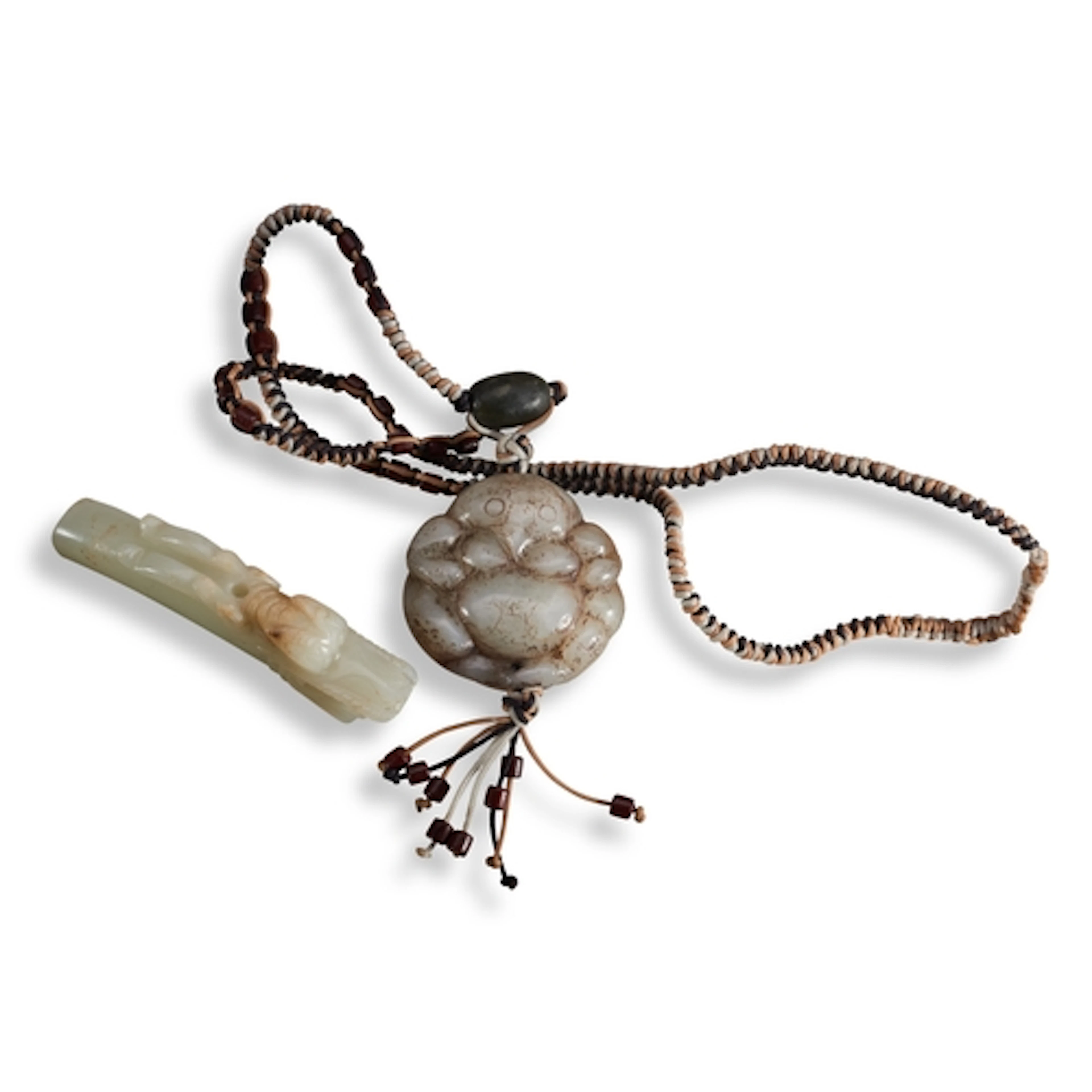 TWO CARVED JADE PENDANTS 19TH / 20TH CENUTURY 青白玉雕龙头及玉鸟 十九/...