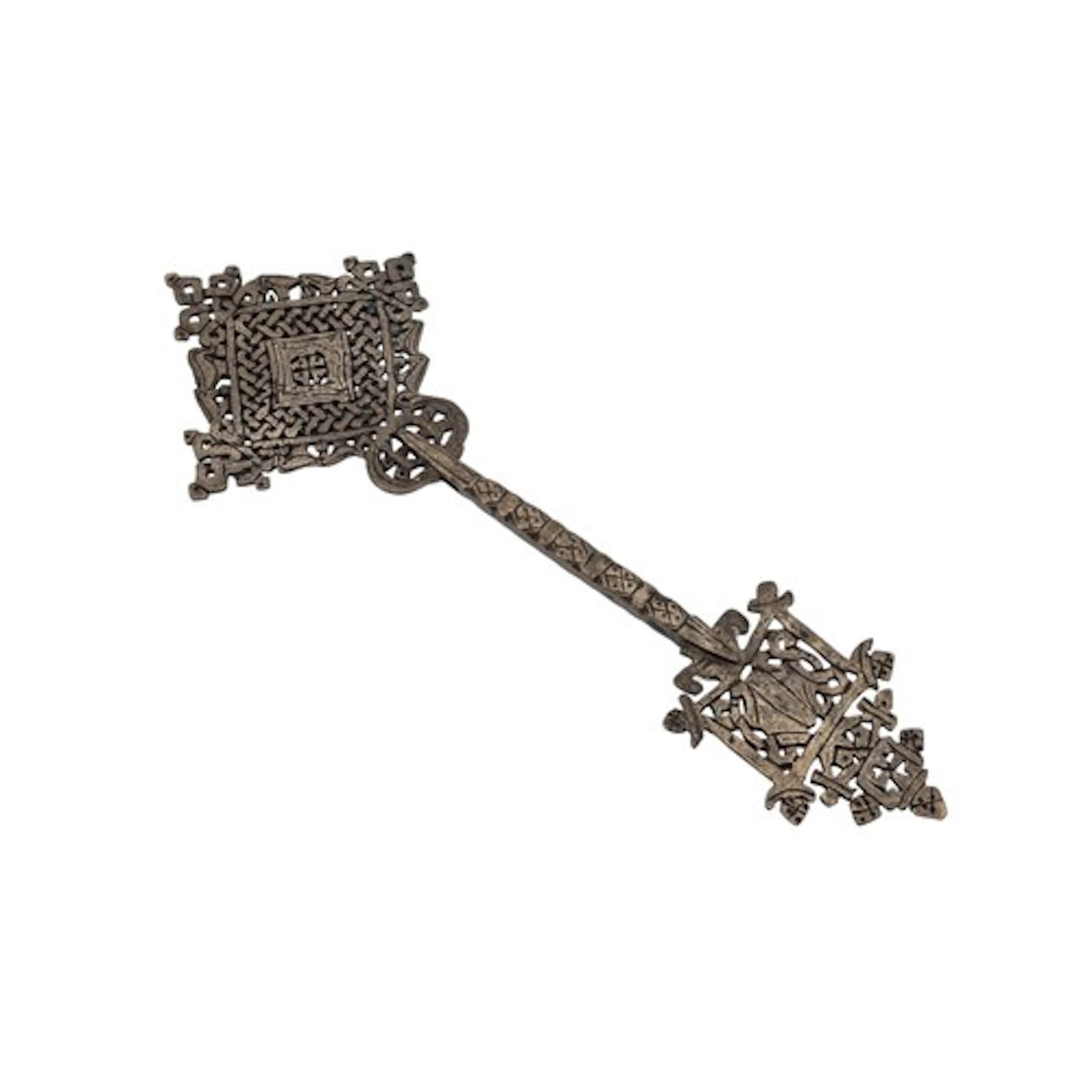 A COPTIC ALLOY RETICULATED CROSS, hand-held and pierced with...