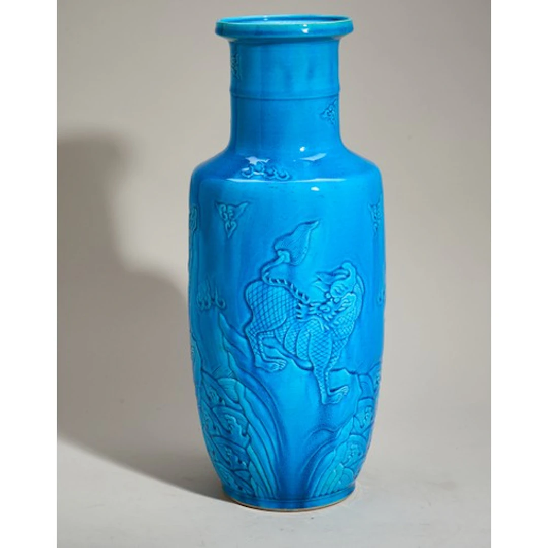 A TURQUOISE-GLAZED 'QILIN' VASE 20TH CENTURY the sides carve...