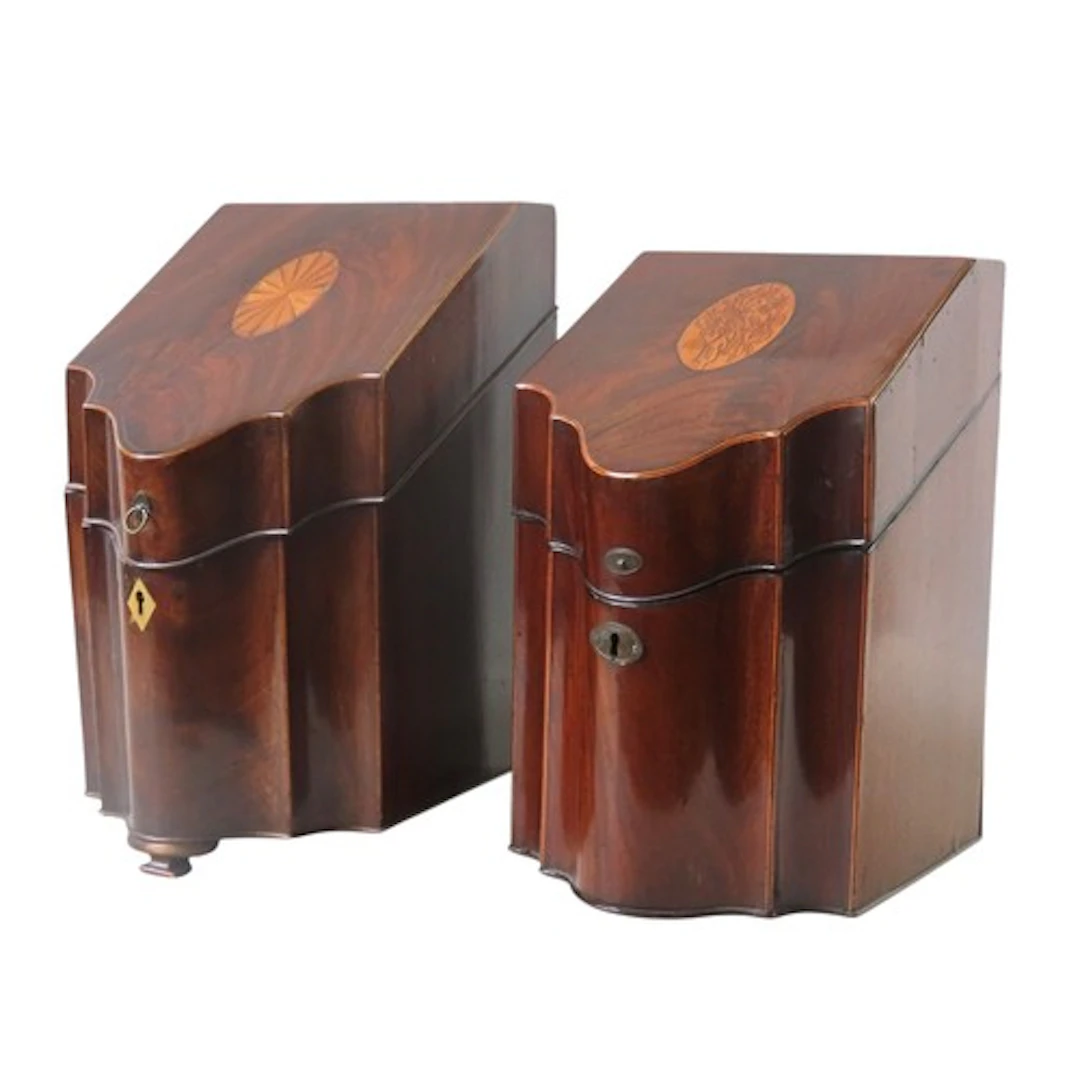TWO GEORGE III MAHOGANY KNIFE BOXES both with serpentine fro...
