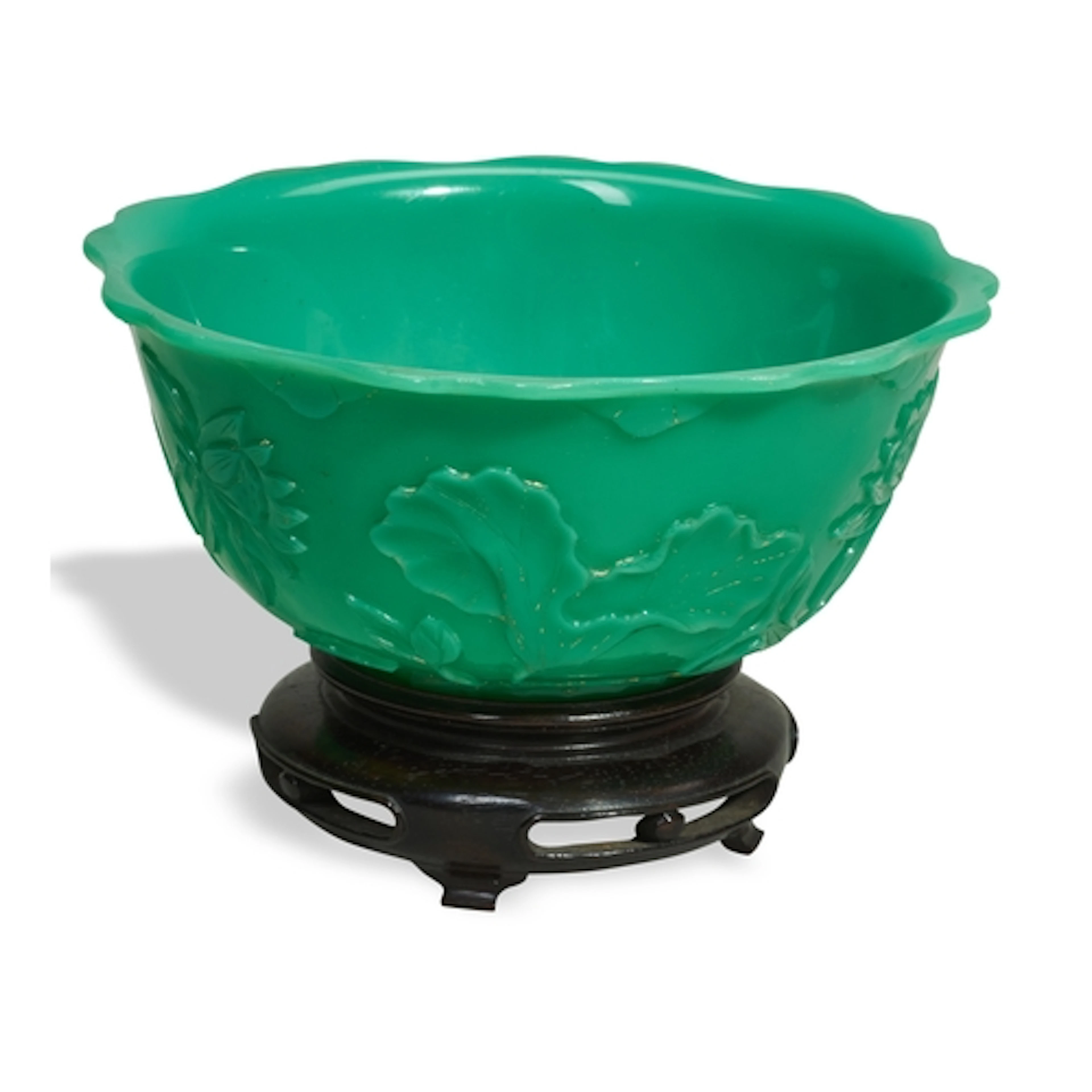 A SEMI-OPAQUE GREEN GLASS 'LOTUS' BOWL QING DYNASTY, 19TH CE...
