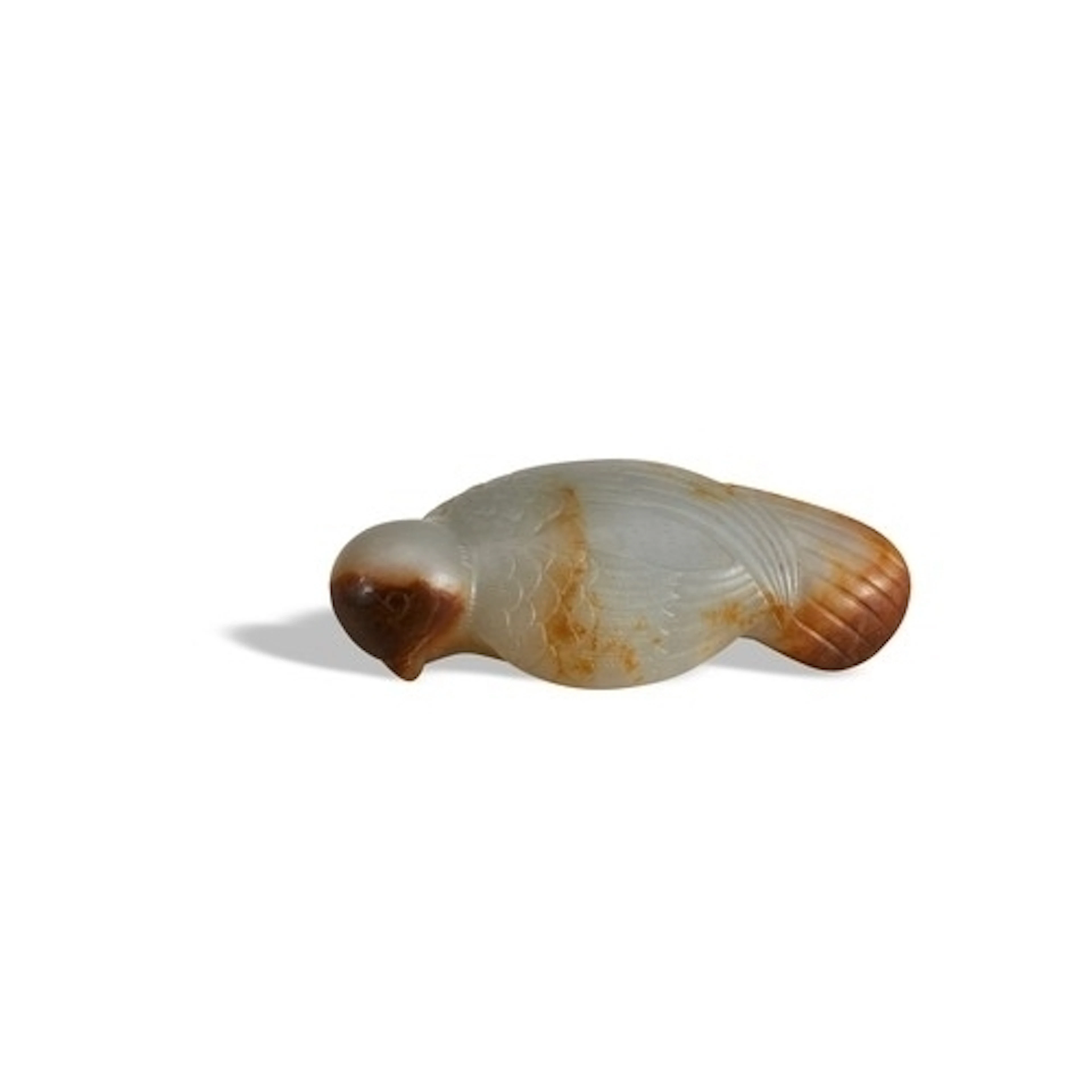 A WHITE AND MOTTLED RUSSET JADE 'BIRD' HAT FINIAL QING DYNAS...