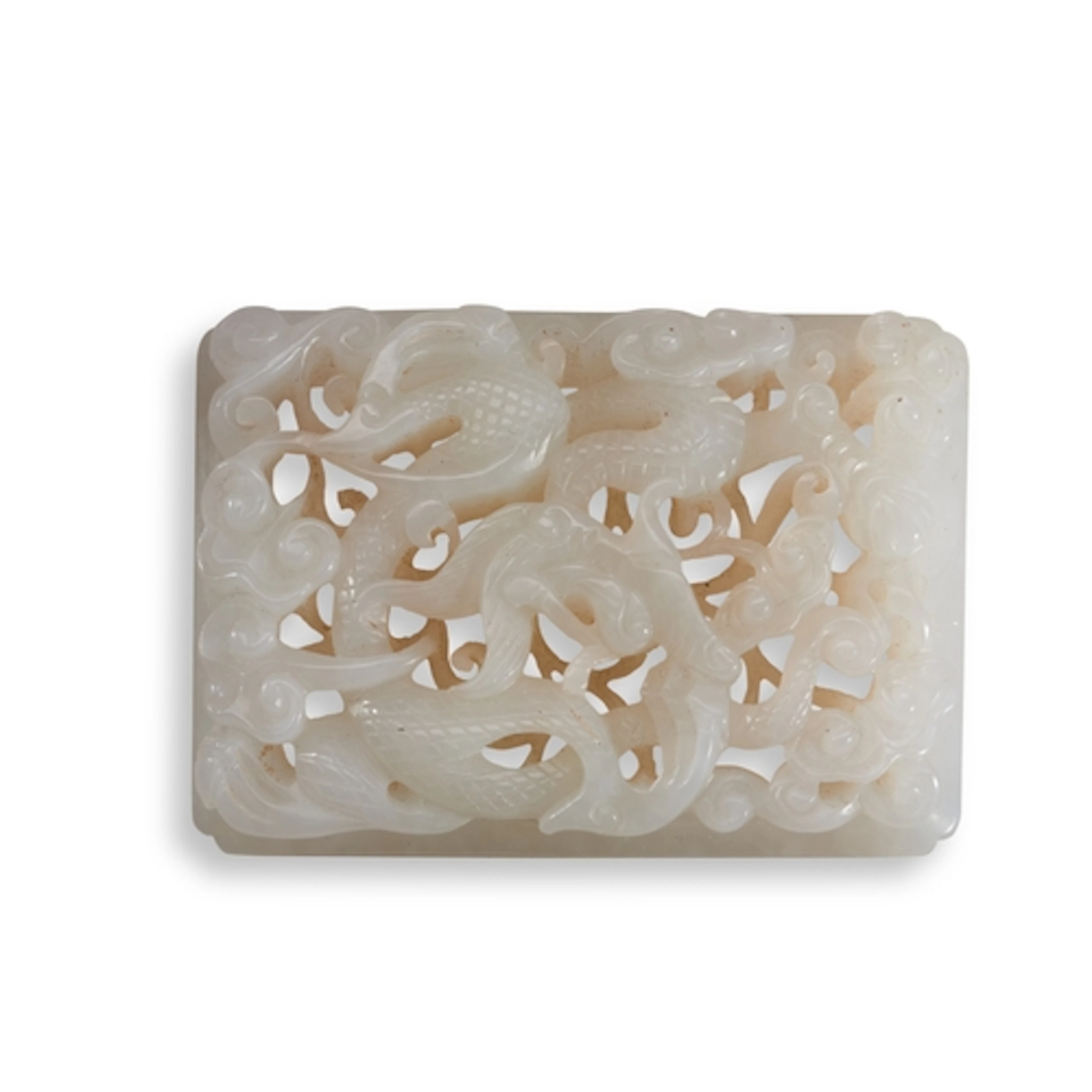 A JADE OPENWORK PLAQUE CARVED WITH DRAGONS, 20TH CENTURY 白玉龙...