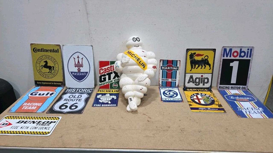 MICHELIN MAN WITH BRACKET & SELECTION OF TIN SIGNS