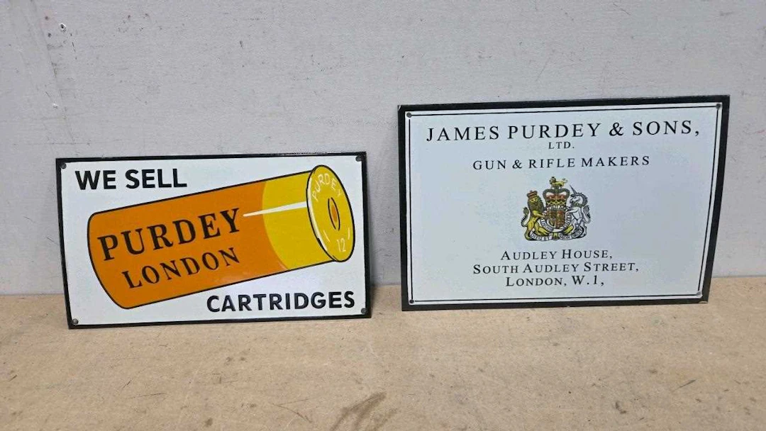 PAIR OF PURDEY REPRO ENAMEL SIGNS 15" X 10"