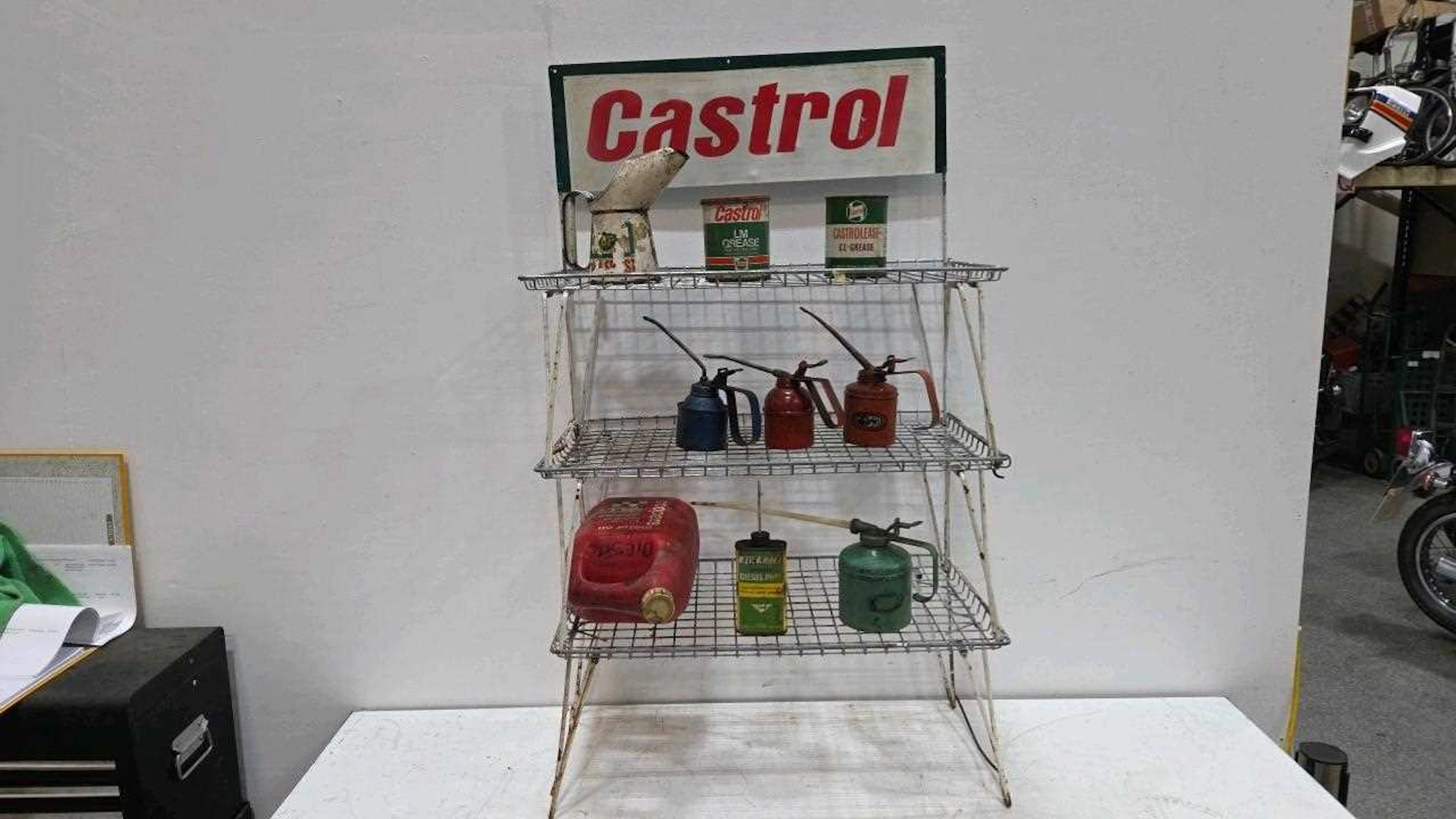CASTROL OIL + GREASE METAL DISPLAY SHELVES WITH TINS AND OIL CANS