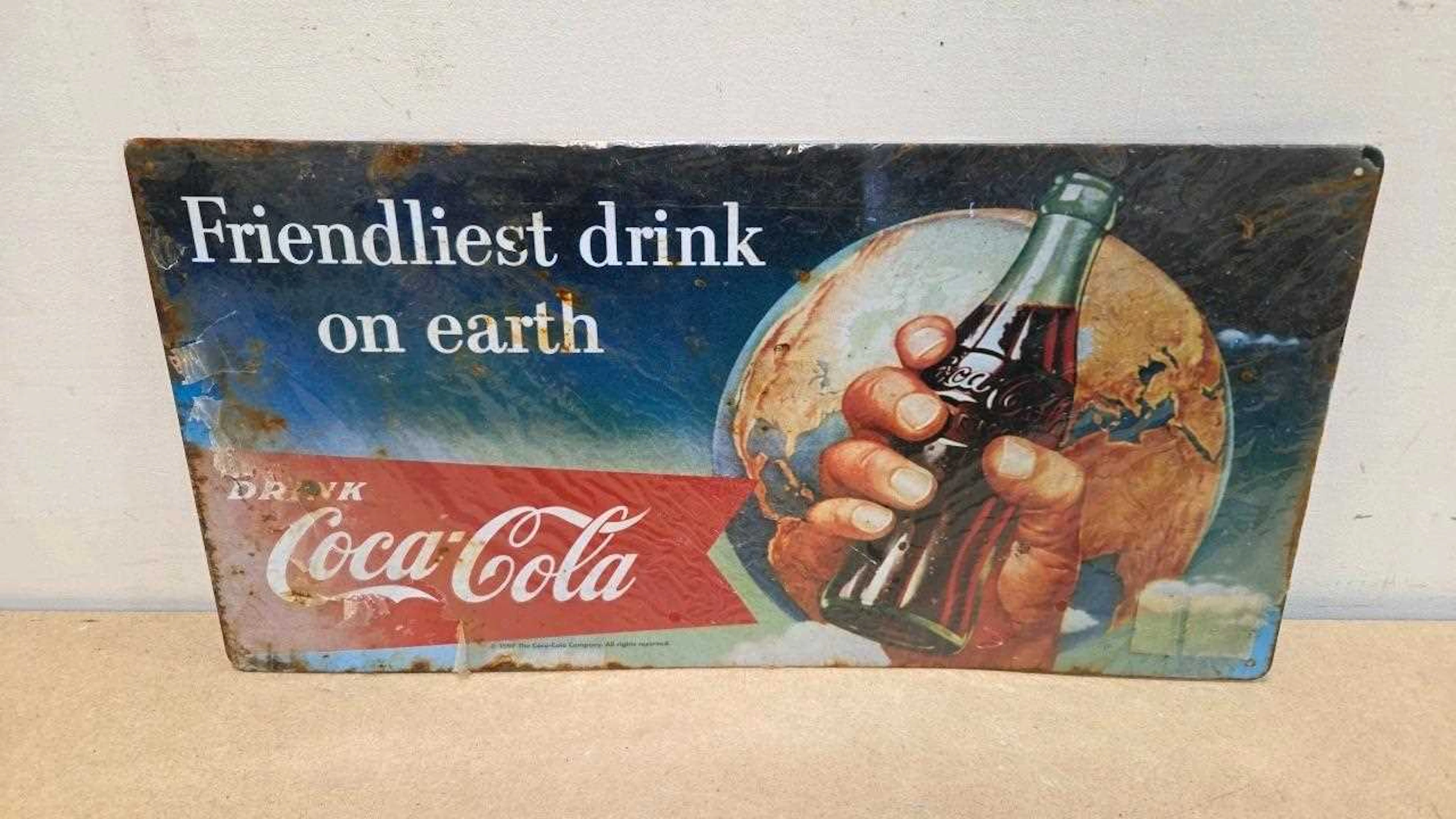 1997 COCA COLA TIN SIGN STILL IN ORIGINAL WRAPPING 20" X 8"